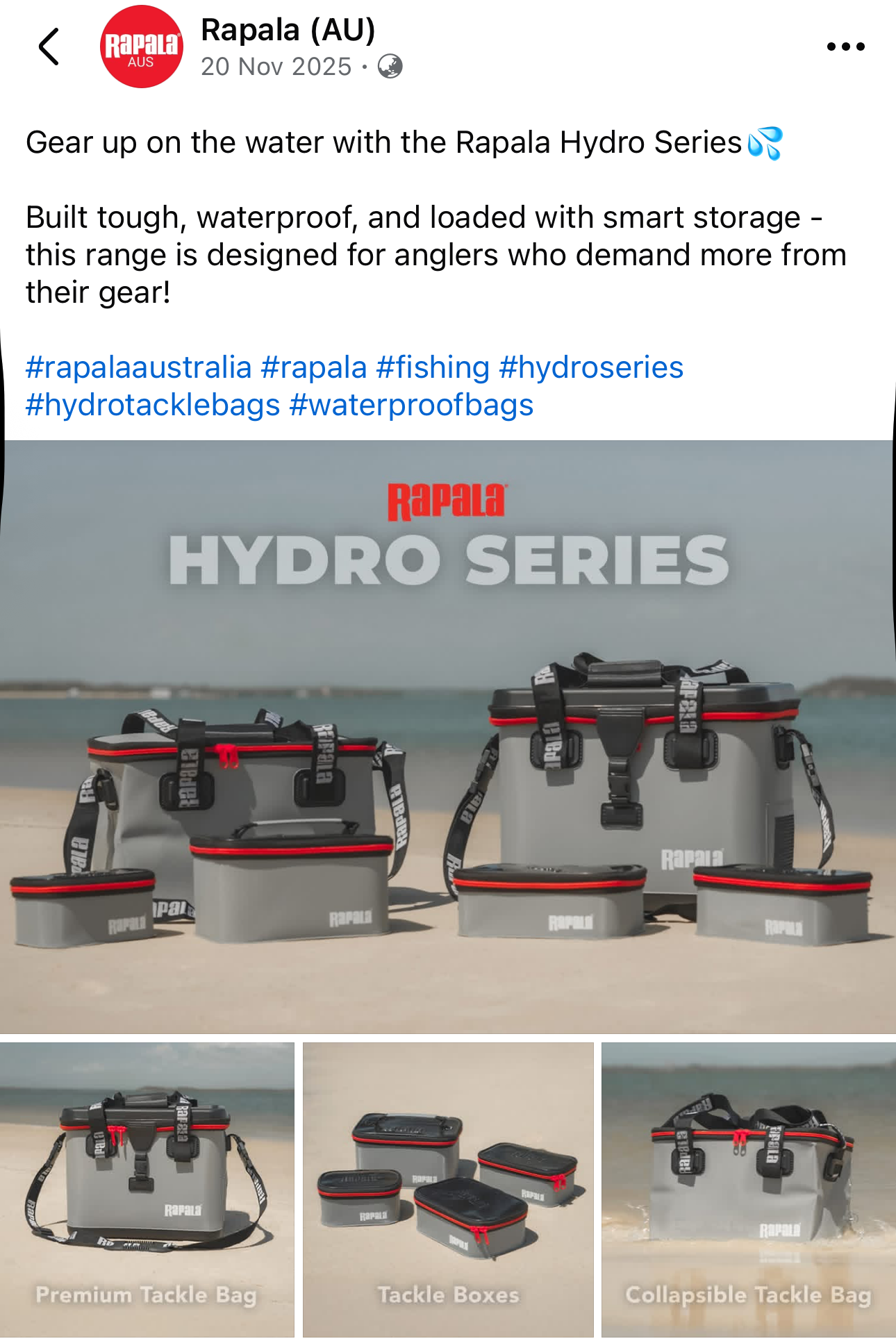 Set of gray waterproof tackle bags and boxes with black straps and red zippers on a beach with ocean in the background, part of the Rapala Hydro Series.