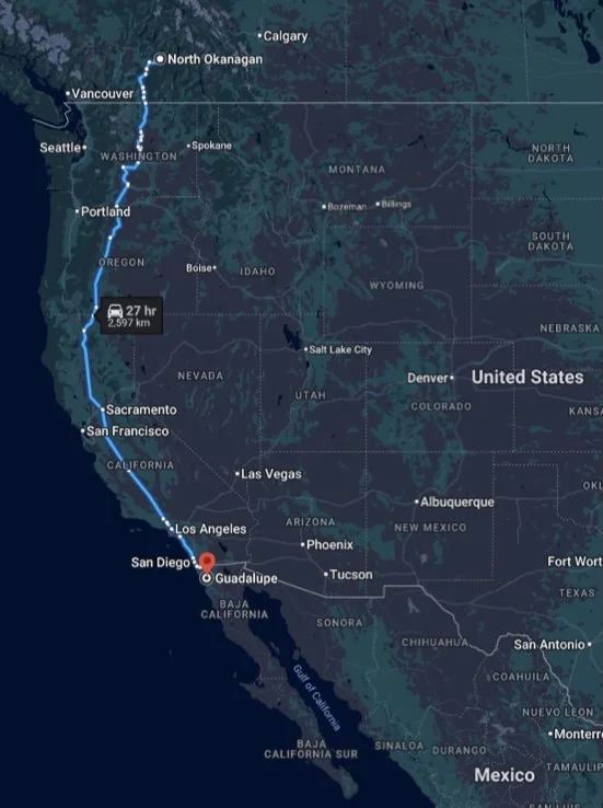Map showing a 2,597 km (27-hour) driving route from Vancouver, Canada, to Guadalupe, Baja California, Mexico, passing through the western United States including cities like Seattle, Portland, Sacramento, and Los Angeles.