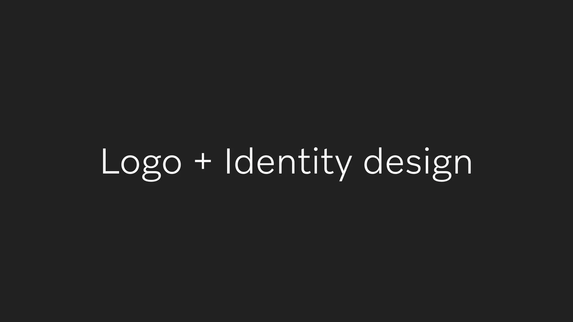 A presentation slide with a black background and white text that says 'Logo + Identity design'.