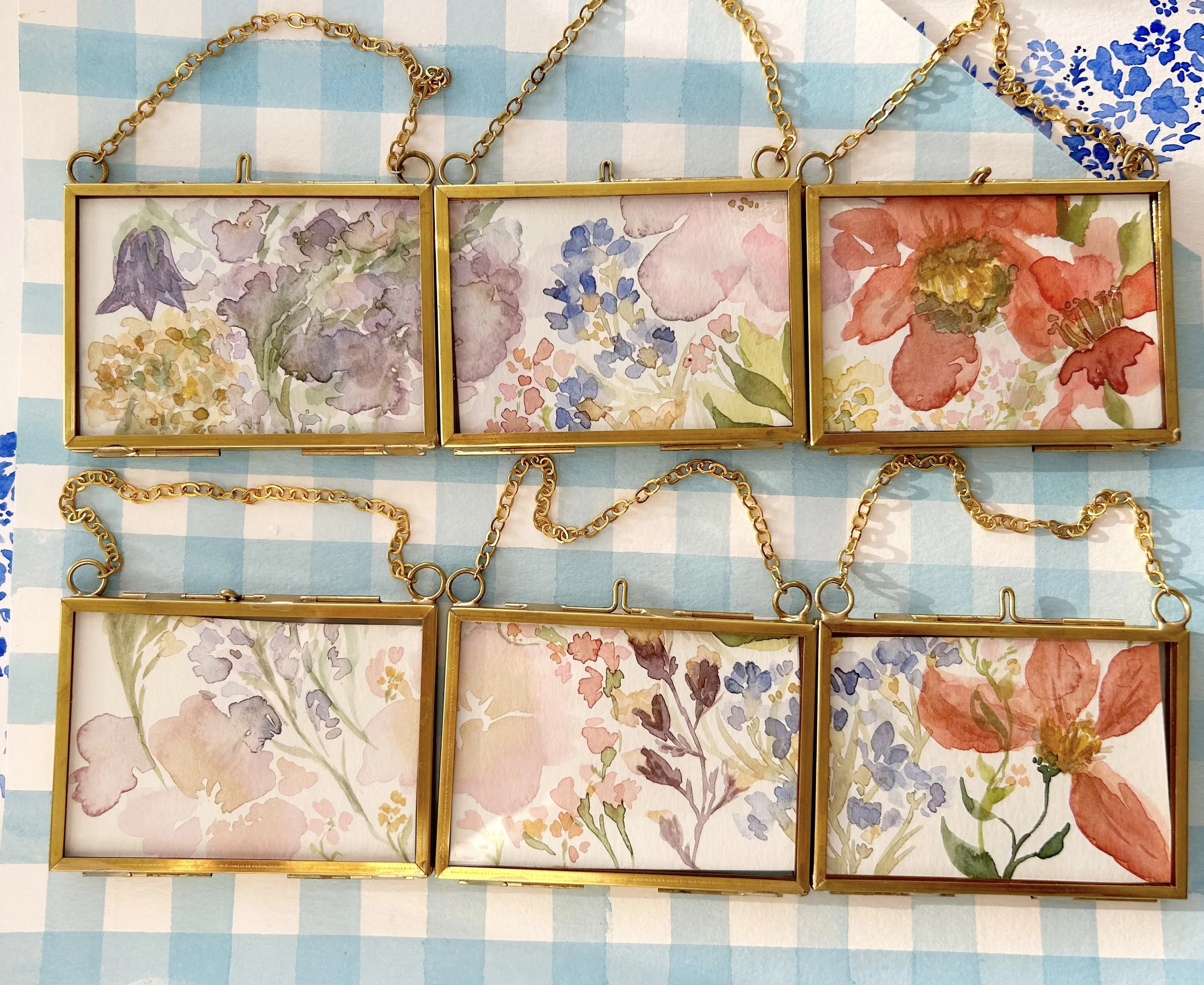 florals in mini frames, brass frames with watercolors on paper, 2024
