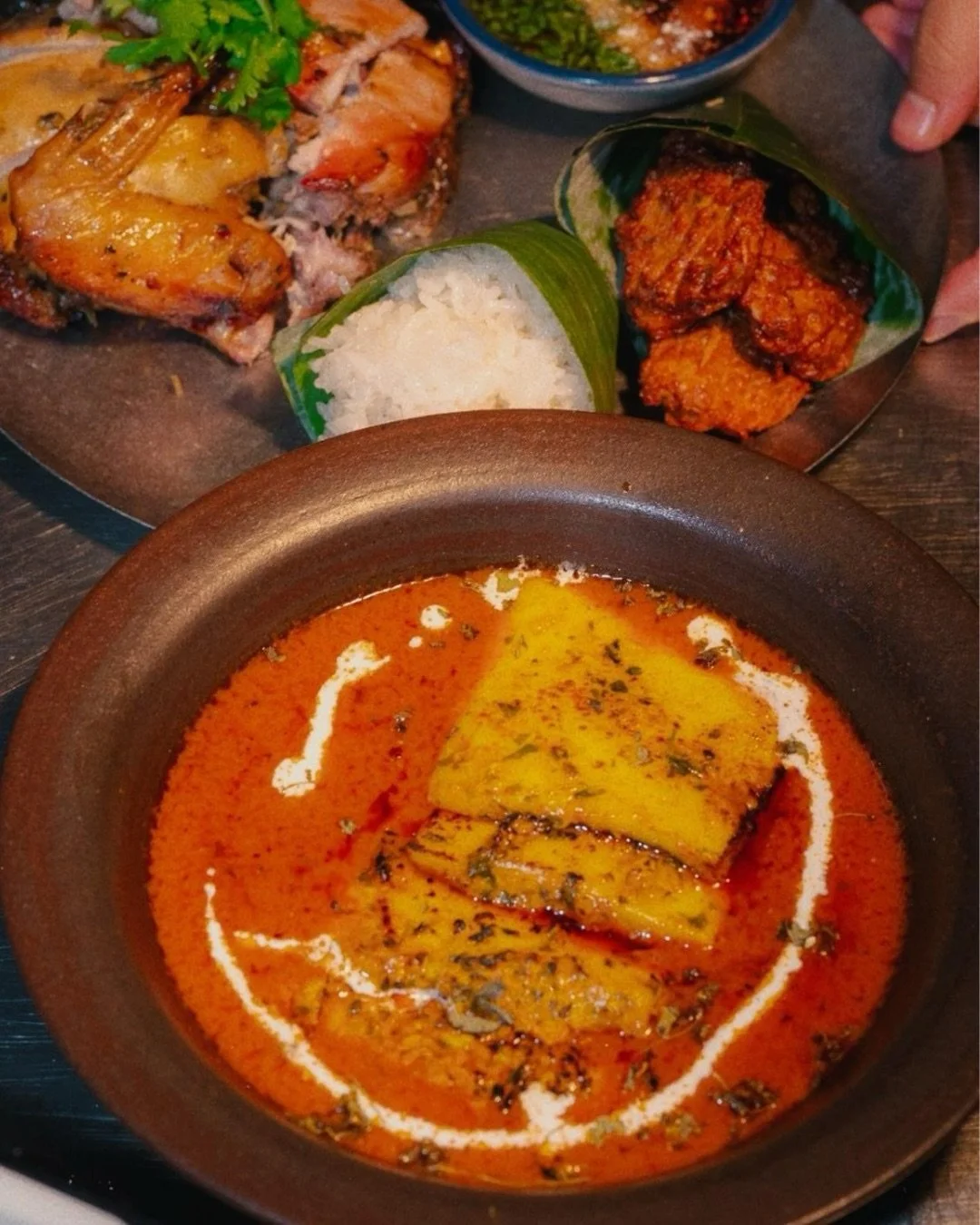 Why choose one when you can have both?

Isaan Grilled Chicken with Sticky Rice and Halloumi Makhni. Two signatures, one very good decision.