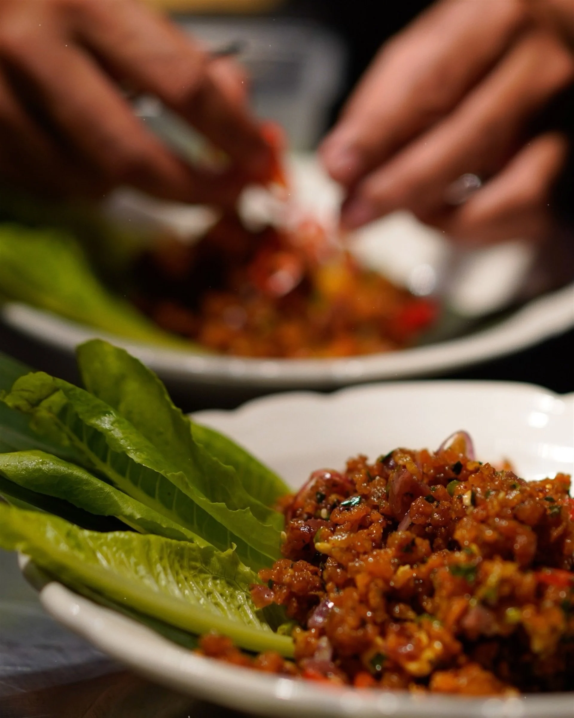 Our crispy rice salad is textural perfection - spicy, sour, savory, and dangerously addictive.