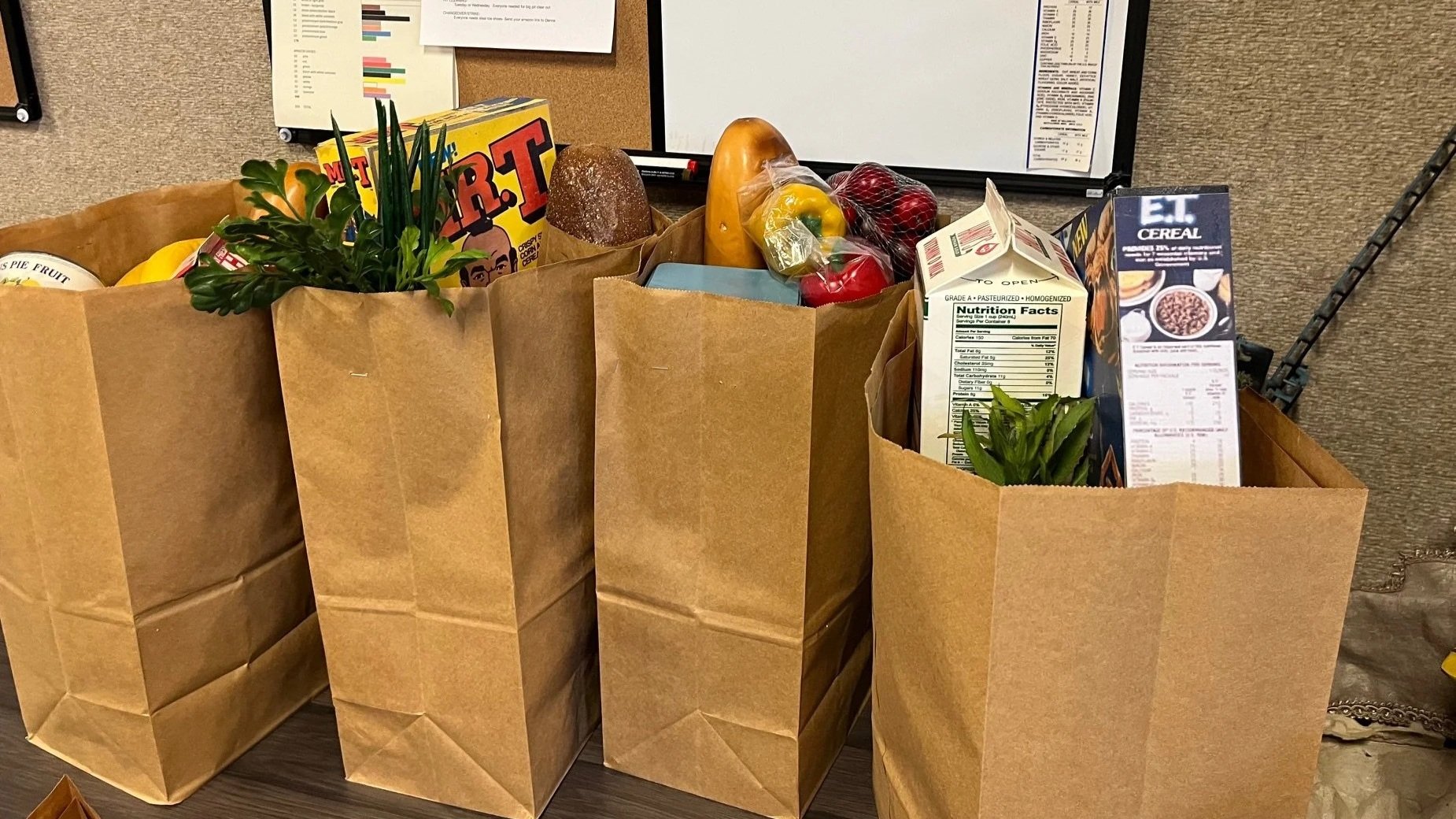 Grocery bags with 1980s faux products.