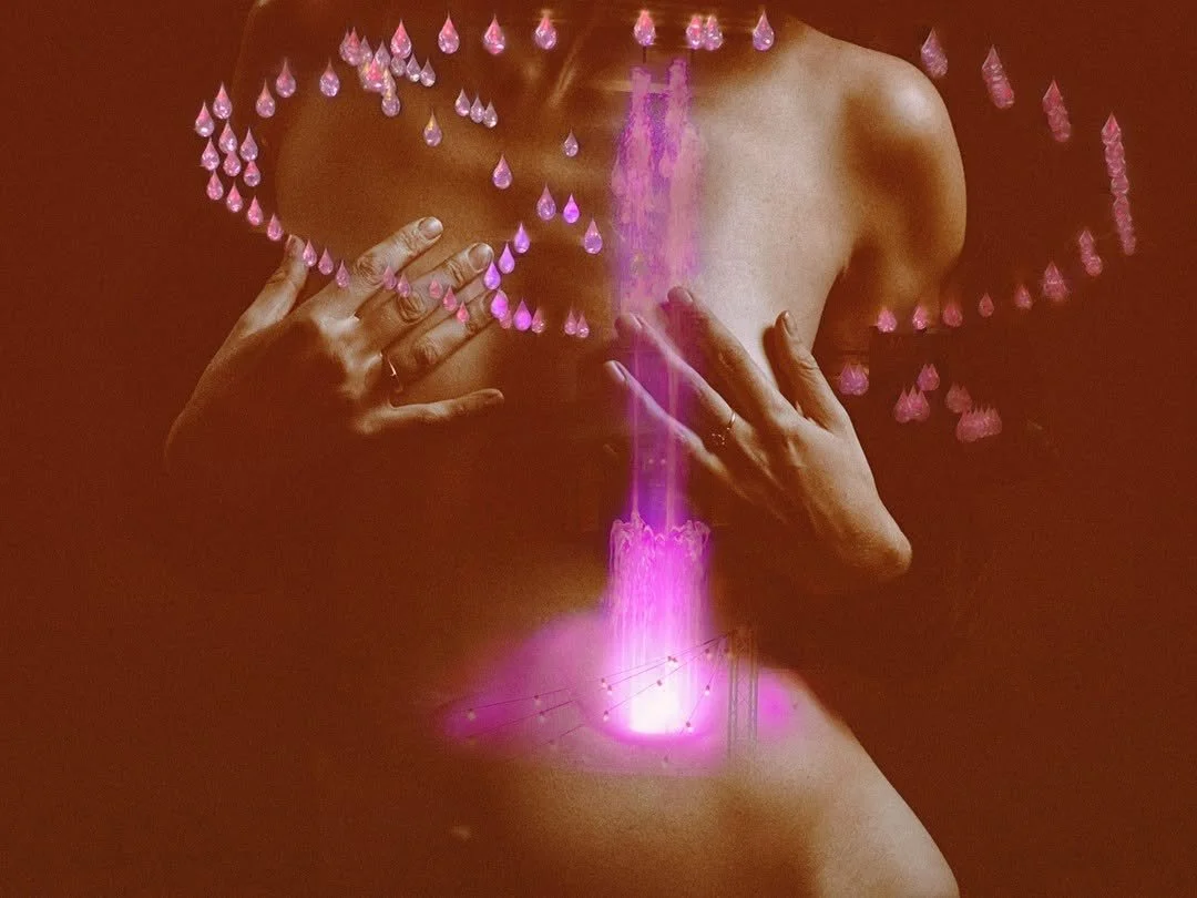 A person's torso and hands are visible, with hands covering breasts. An overlay of pink and purple glowing elements include water droplets around the shoulders and a vertical glow from the middle of the chest to the lower abdomen, resembling a founta