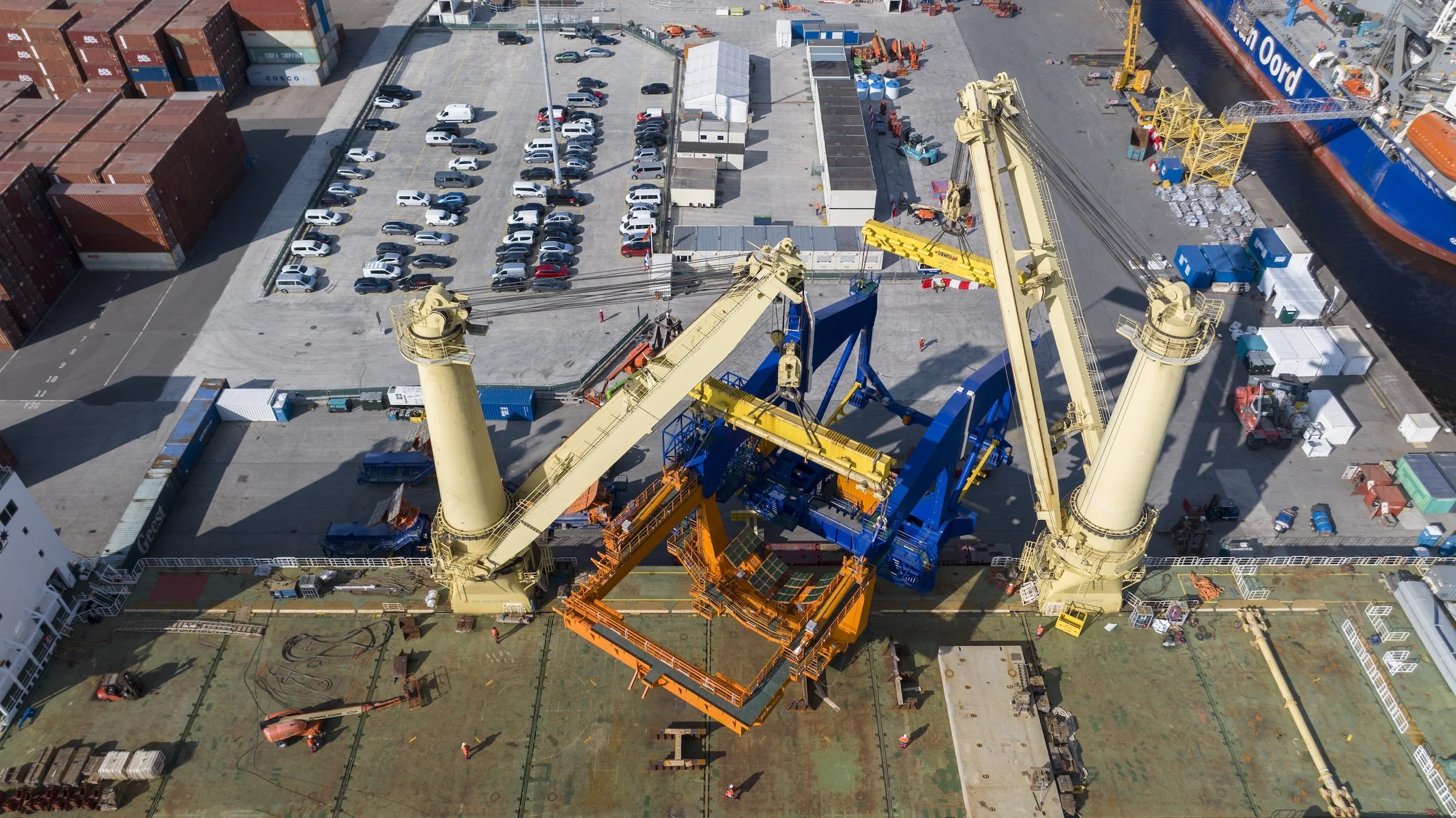 Jumbo Jubilee vessel operations TMA Terminal Amsterdam Netherlands. Professional maritime photography documenting heavy-lift capabilities cargo handling terminal coordination IJmuiden.