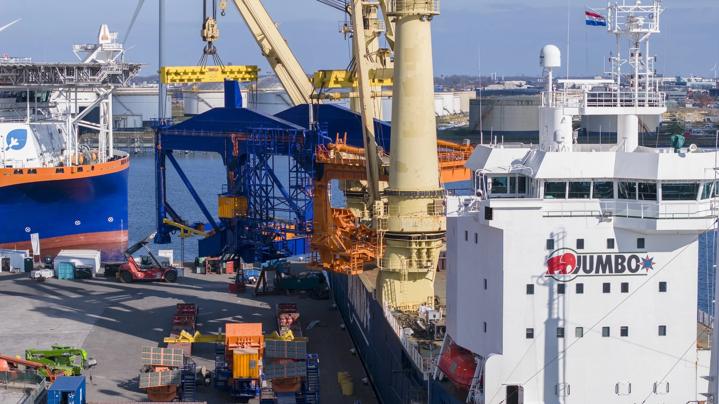 Port of Amsterdam Jumbo Maritime heavy-lift documentation. Specialized cargo vessel operations captured across three-day operation TMA Terminal IJmuiden controlled airspace Netherlands.