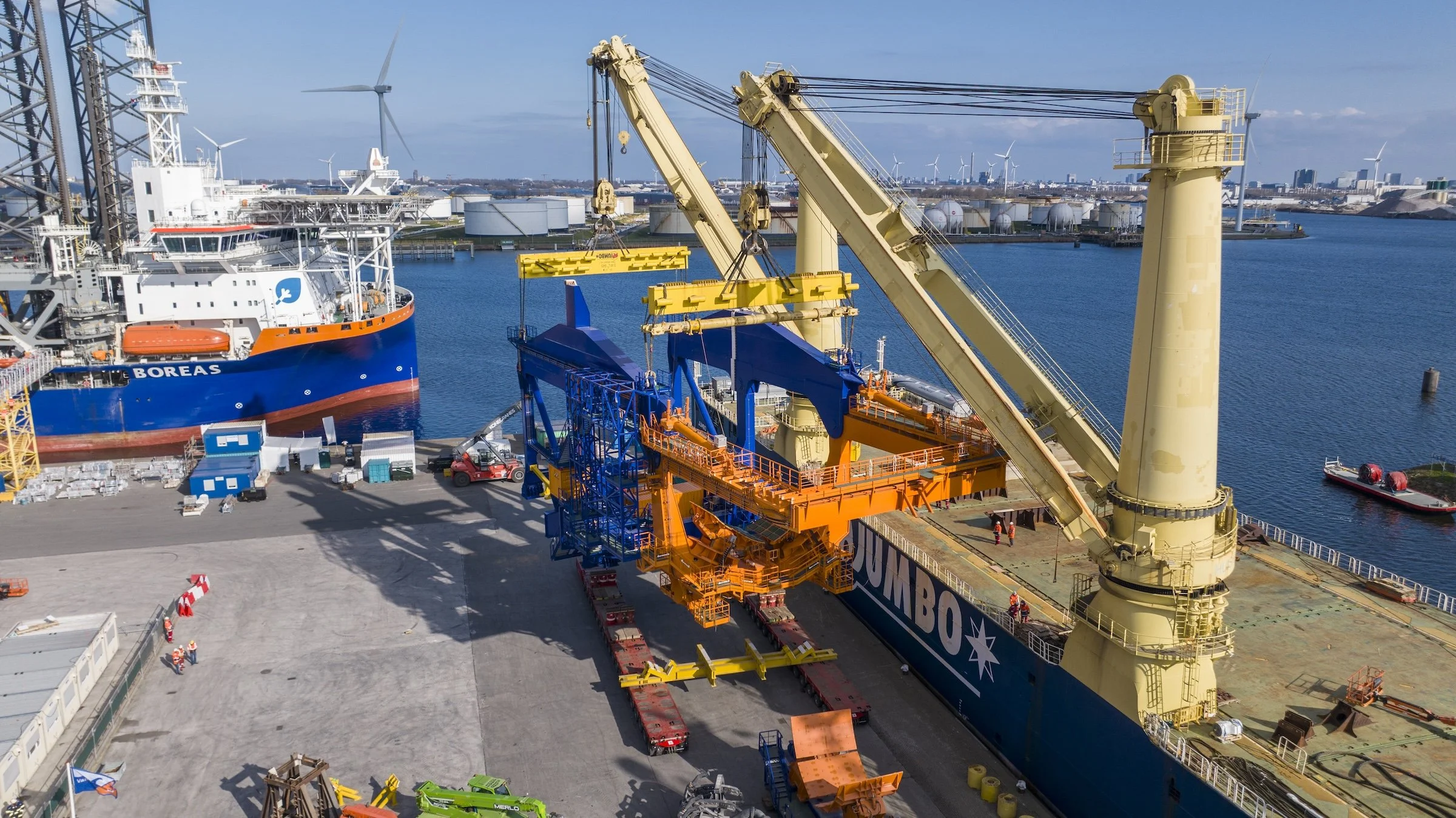 Jumbo Jubilee vessel operations completion Port of Amsterdam IJmuiden. Final cargo offloading phases documented through drone operations photography timelapse Netherlands terminal.