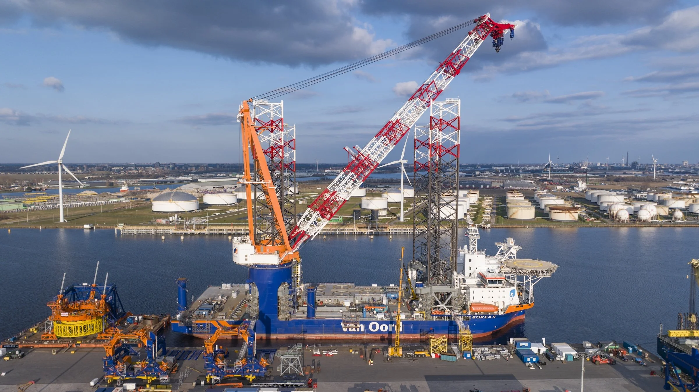 Jumbo Jubilee vessel operations completion Port of Amsterdam IJmuiden. Final cargo offloading phases documented through drone operations photography timelapse Netherlands terminal.