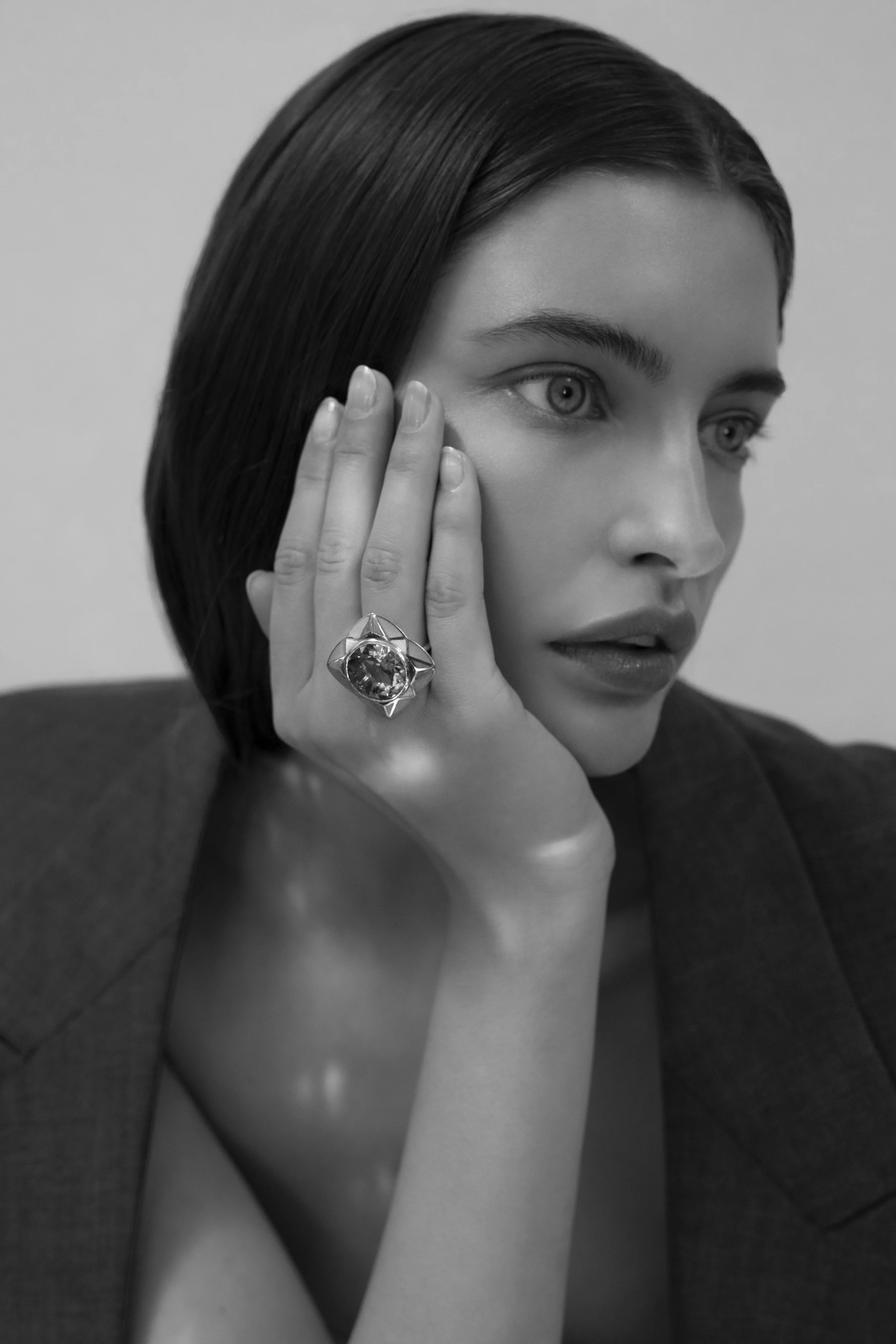 SUNRISE AURORA RING BY Tarra Rosenbaum. Gold ring with a large, faceted yellow citrine and vitreous enamel.