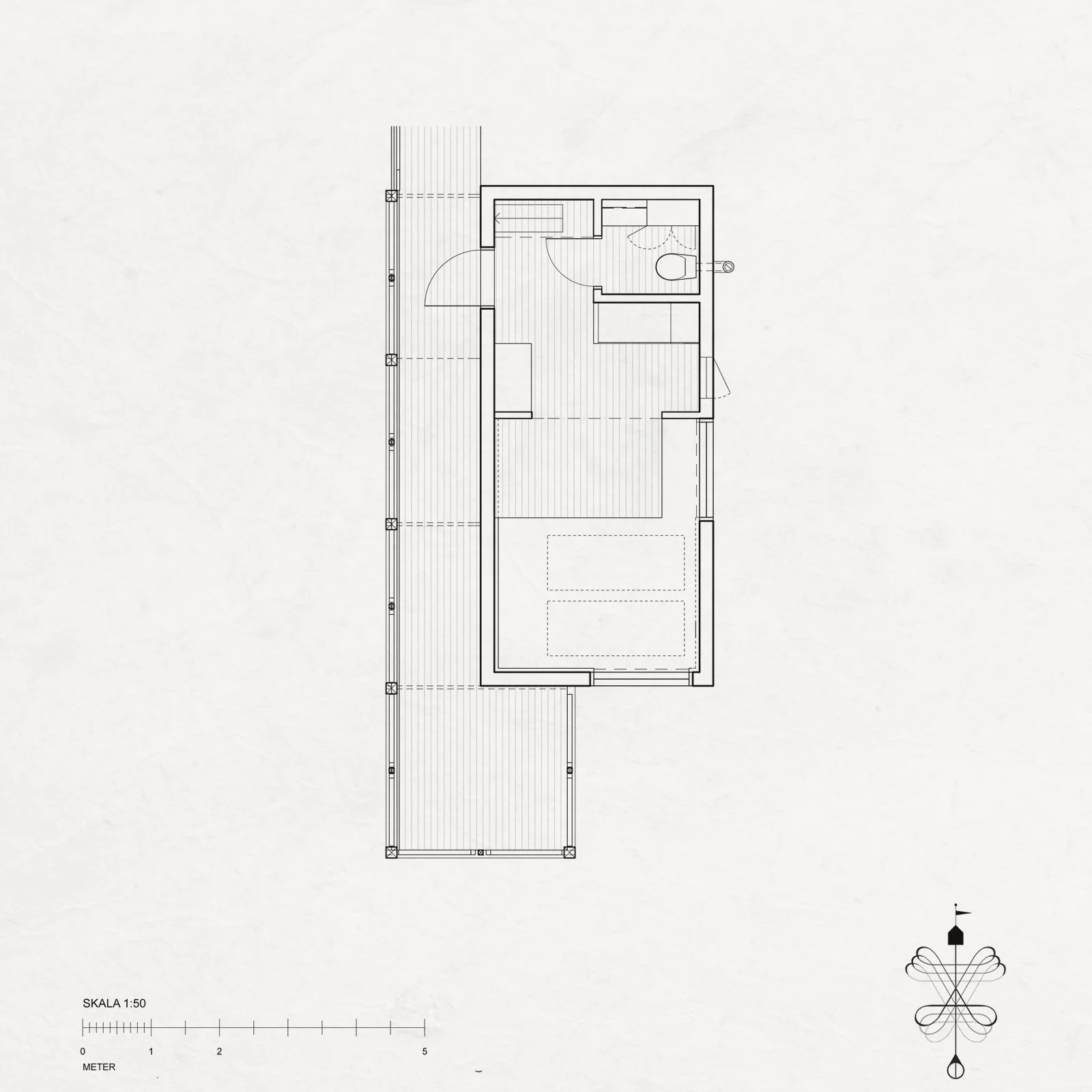 Architectural floor plan of a small building, showing a main living area, a bathroom, and an outdoor deck.