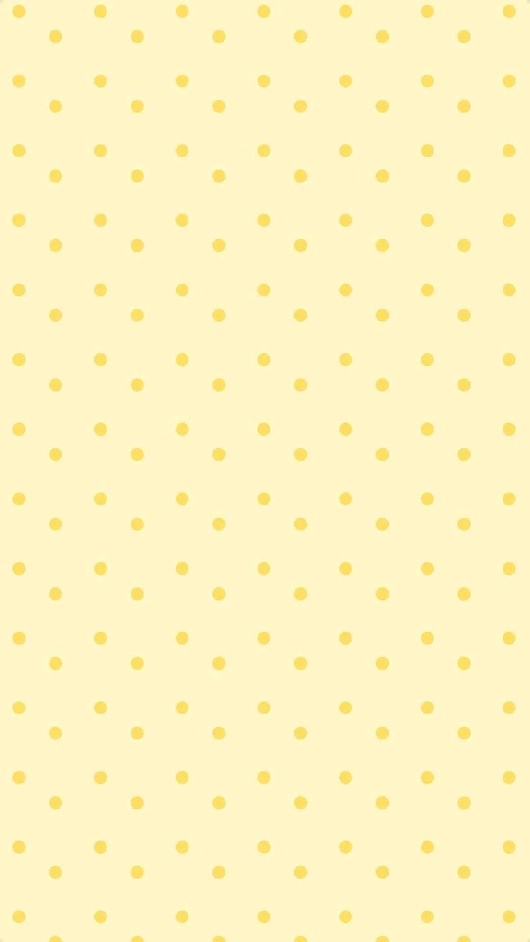Yellow background with evenly spaced darker yellow polka dots.