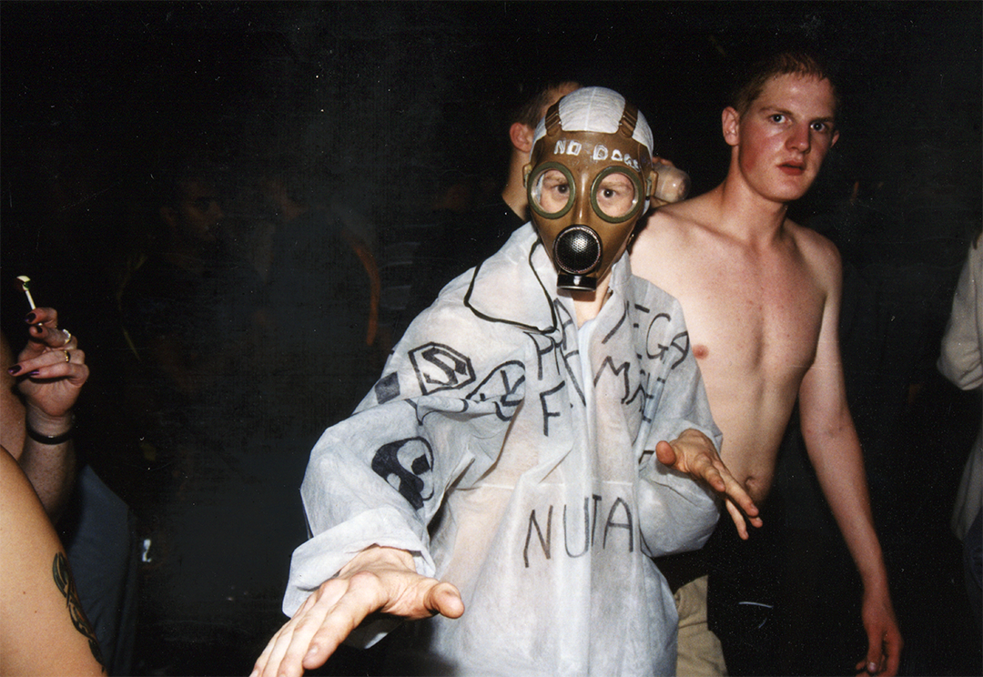 Raver wearing protective mask at UK underground rave from the Cult to Culture archive