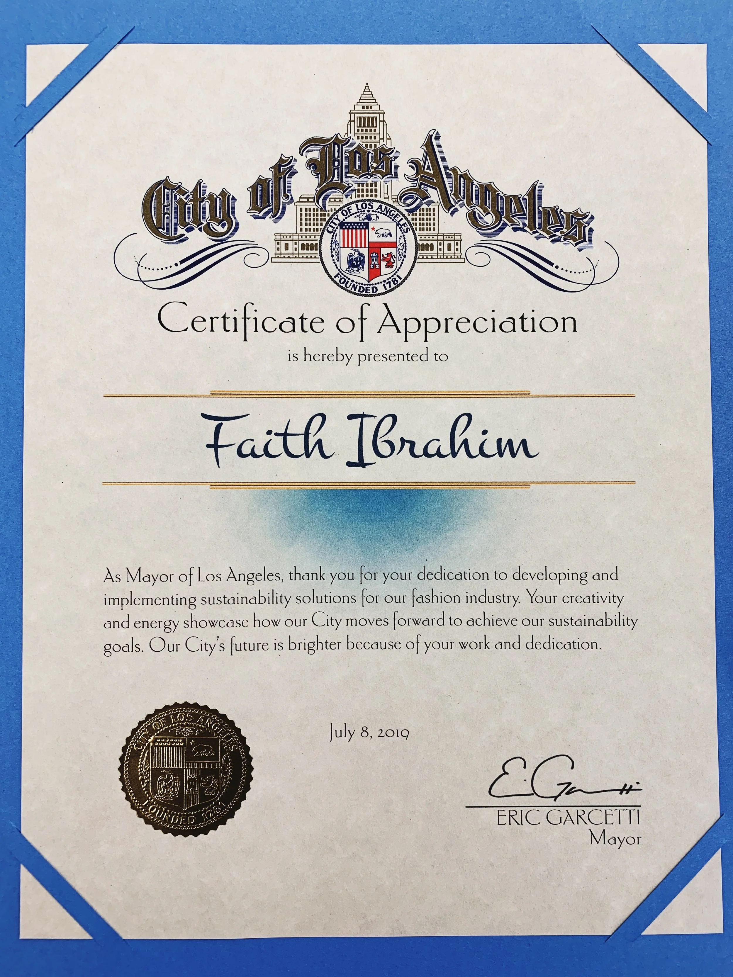 Certificate of Appreciation from the City of Los Angeles awarded to Faith Ibrahim, signed by Mayor Eric Garcetti, dated July 8, 2019.
