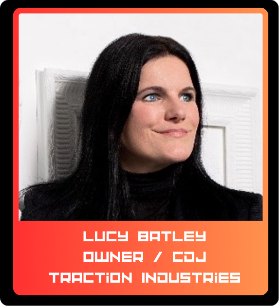 Lucy Batley, owner of CJJ Traction Industries, sitting and looking to the side with black hair and wearing a black top.