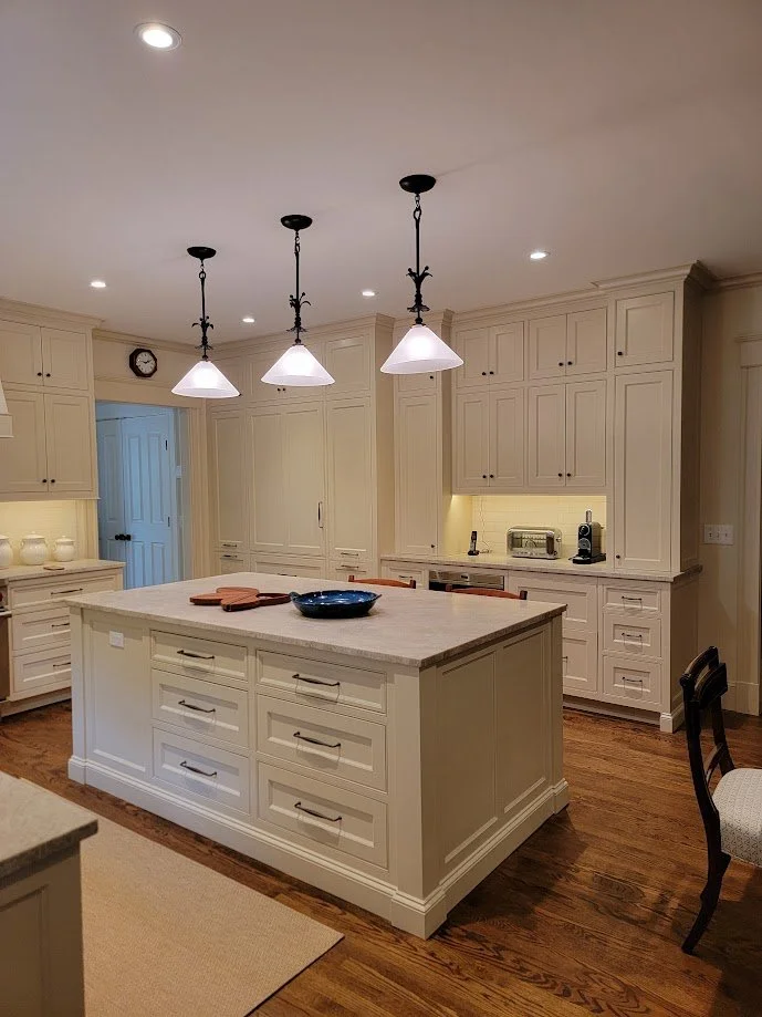 Inset cabinetry with beaded face frames, full-height storage, and perfect island proportions.