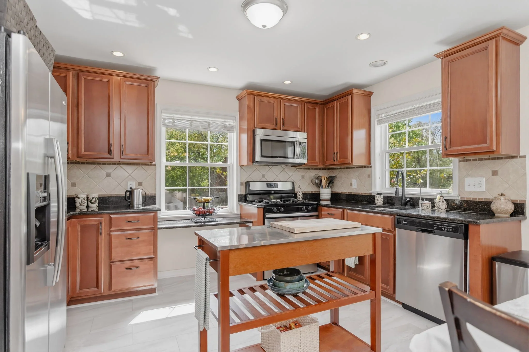 02-samantha-bard-13703-penwith-ct-kitchen-cherry-cabinets-dark-granite-island-chantilly-va-20151.jpg