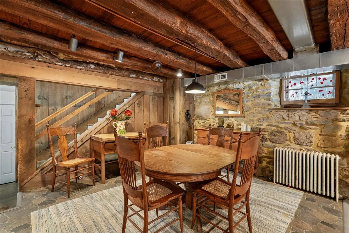 30-samantha-bard-13064-furnace-mountain-rd-dining-room-stone-log-beams-lovettsville-va-20180.jpg
