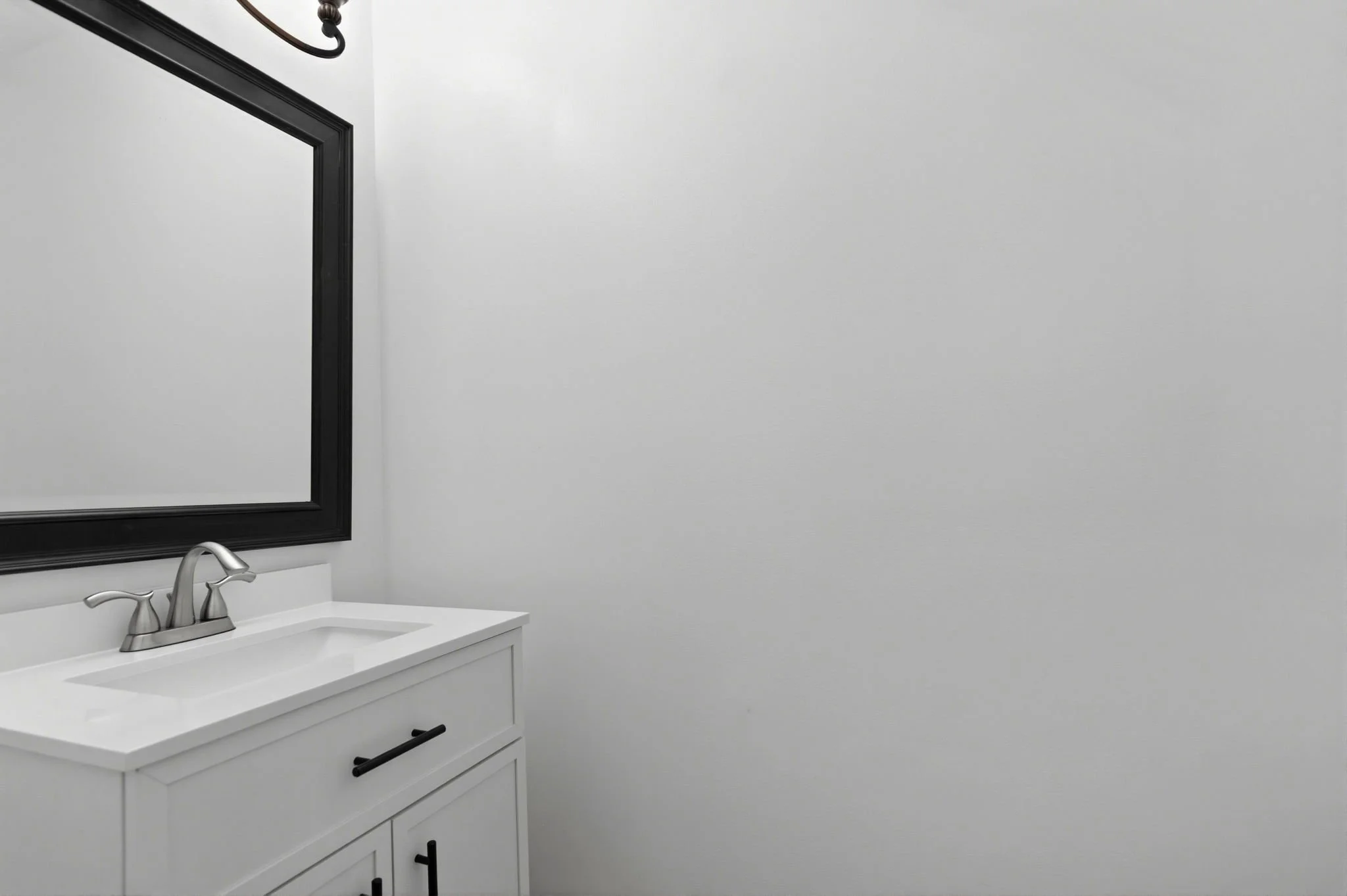 56-samantha-bard-4445-holly-ave-bath-white-vanity-black-mirror-fairfax-va-22030.jpg