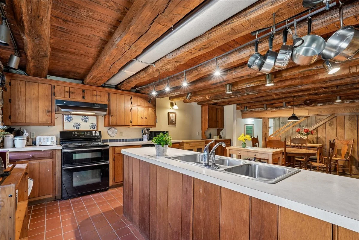 27-samantha-bard-13064-furnace-mountain-rd-kitchen-island-sink-log-ceiling-lovettsville-va-20180.jpg