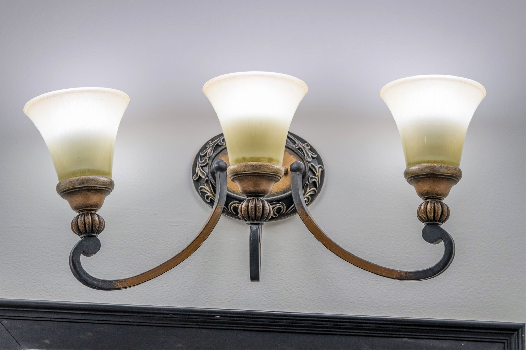 55-samantha-bard-4445-holly-ave-primary-bath-vanity-light-detail-fairfax-va-22030.jpg
