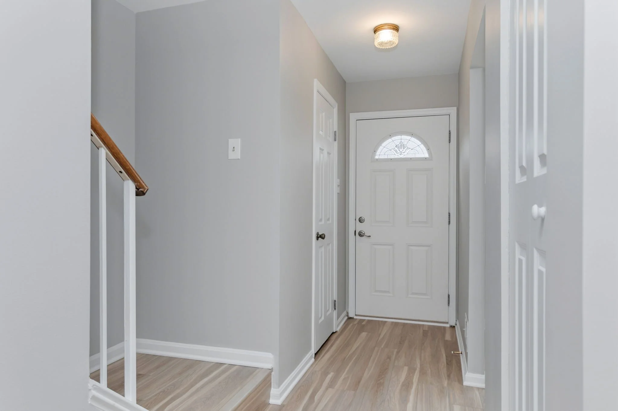11-samantha-bard-4445-holly-ave-foyer-entry-lvp-floors-fairfax-va-22030.jpg