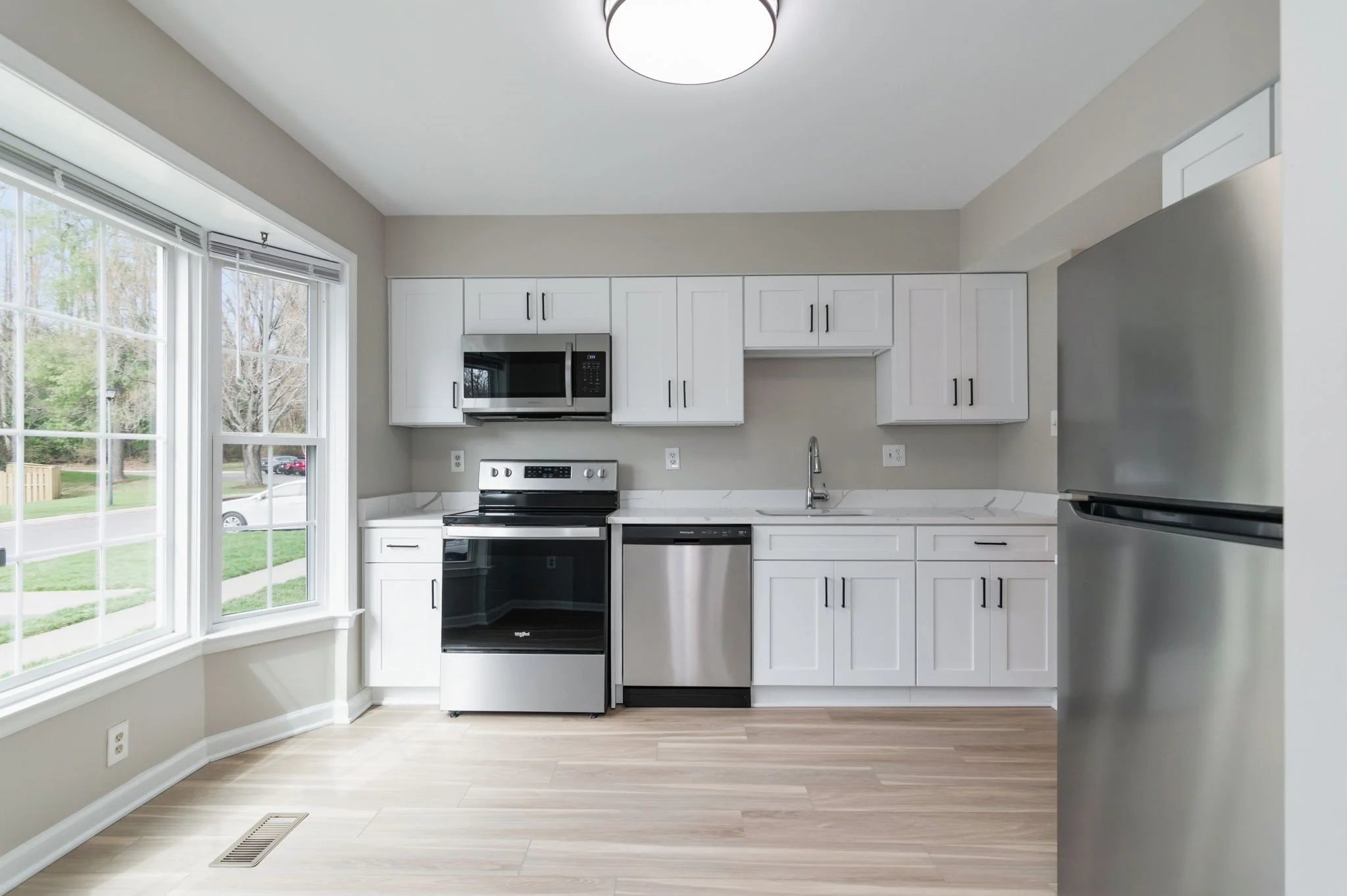 13-samantha-bard-4445-holly-ave-kitchen-white-cabinets-stainless-fairfax-va-22030.jpg