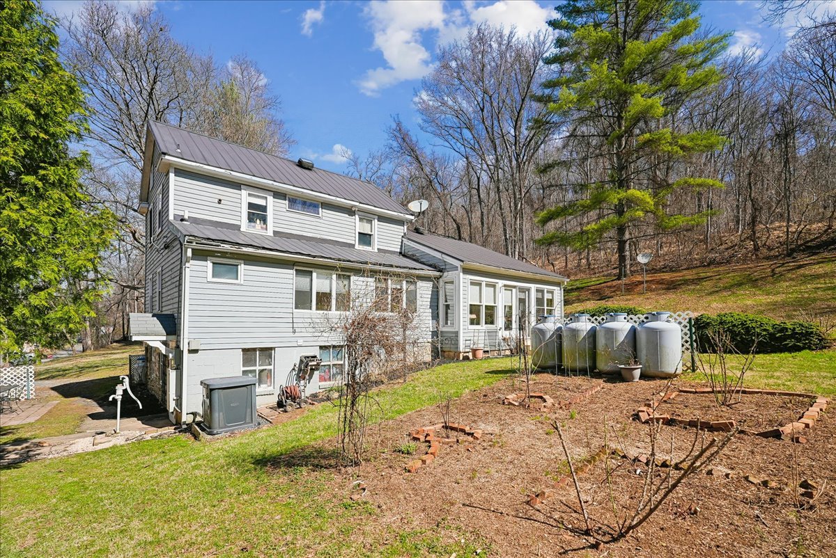 13-samantha-bard-13064-furnace-mountain-rd-rear-exterior-stone-foundation-lovettsville-va-20180.jpg