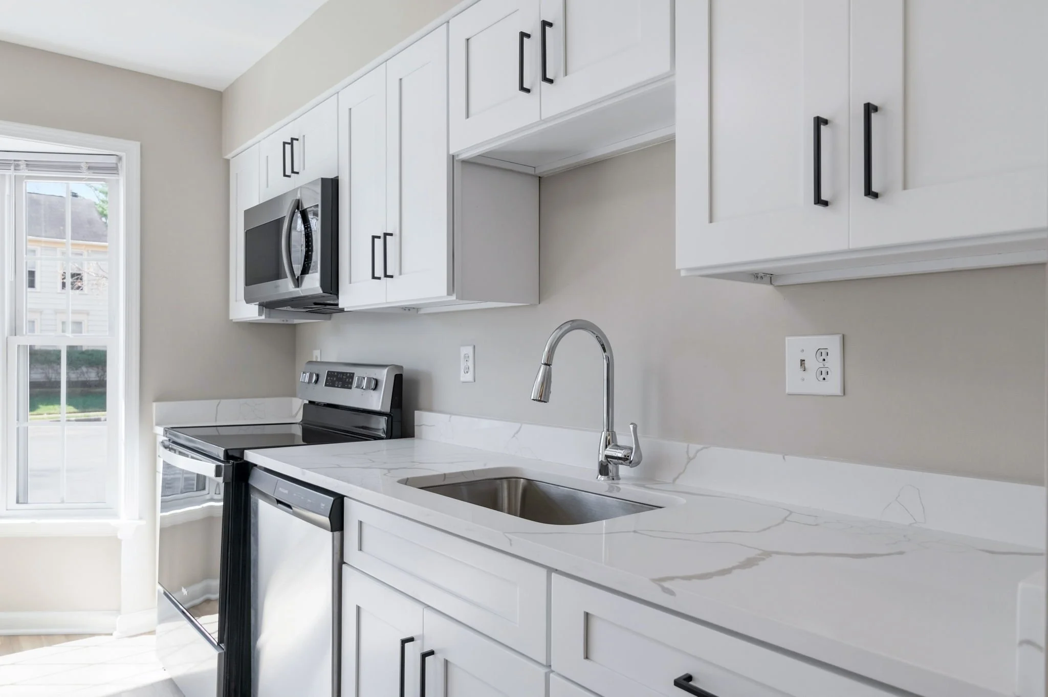 50-samantha-bard-4445-holly-ave-kitchen-quartz-counters-sink-detail-fairfax-va-22030.jpg