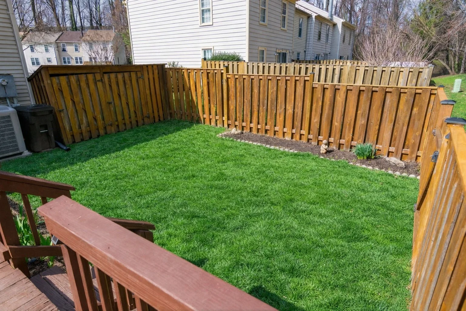 57-samantha-bard-4445-holly-ave-backyard-fenced-deck-stairs-virtually staged - fairfax-va-22030.jpg