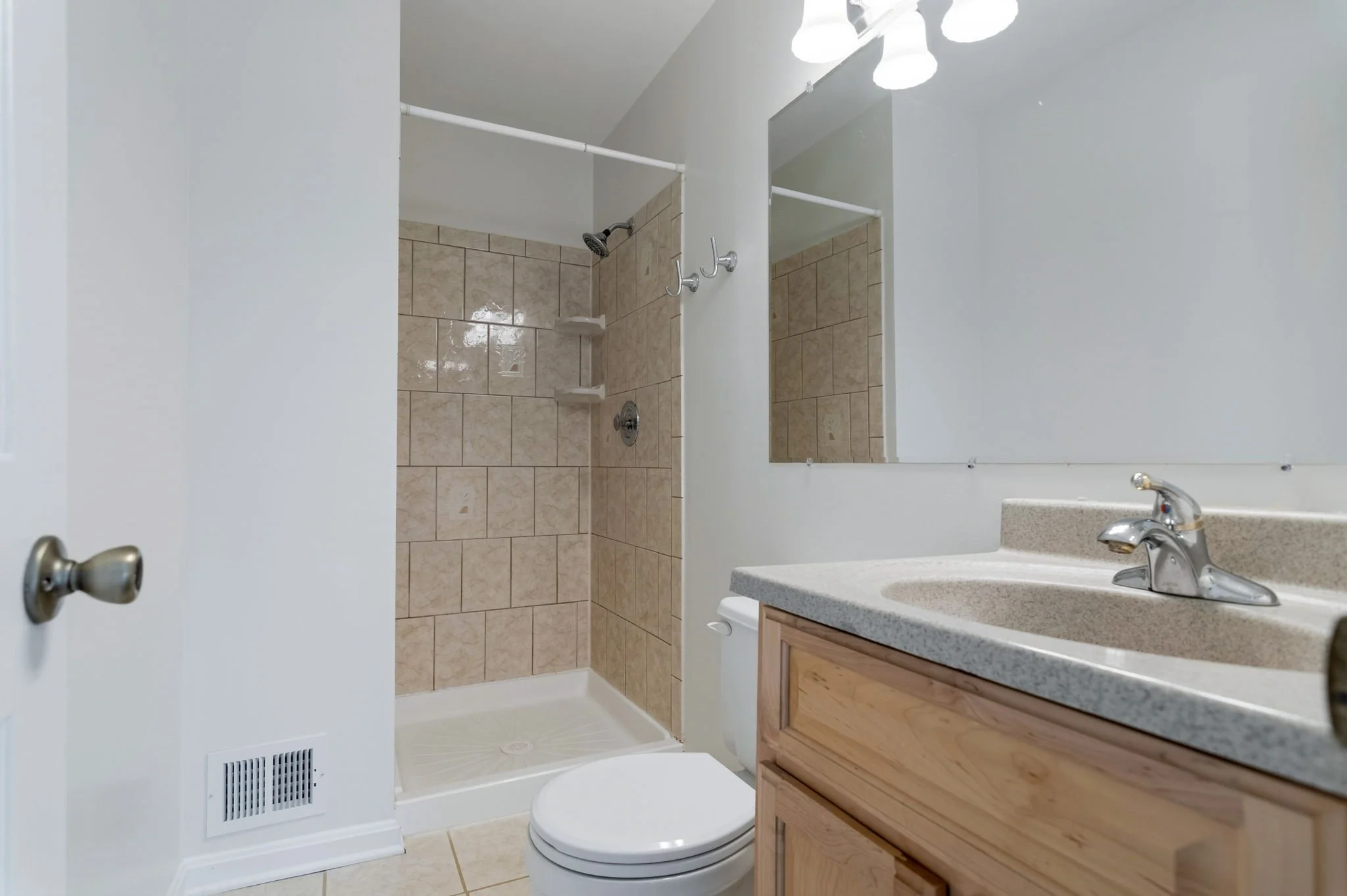 31-samantha-bard-4445-holly-ave-primary-bath-tile-shower-vanity-fairfax-va-22030.jpg
