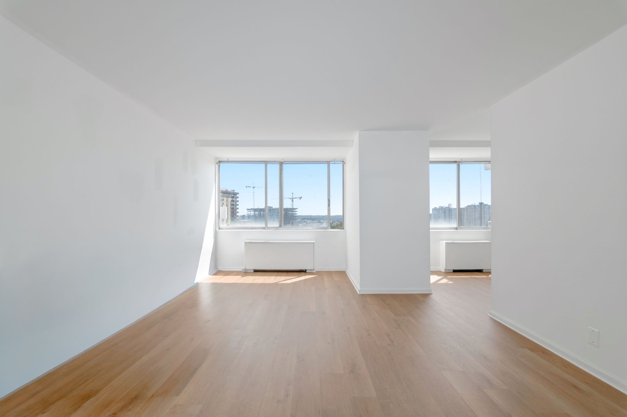 07-samantha-bard-301-n-beauregard-st-unit-902-living-room-dual-windows-alexandria-va-22312.jpg
