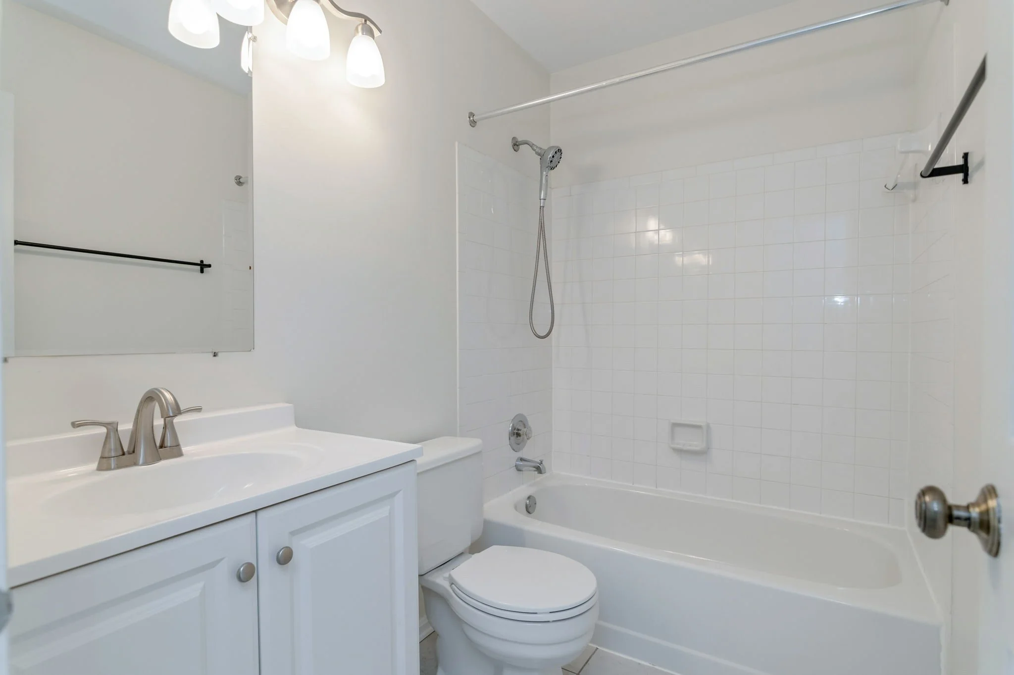 39-samantha-bard-4445-holly-ave-hall-bath-tub-shower-white-vanity-fairfax-va-22030.jpg