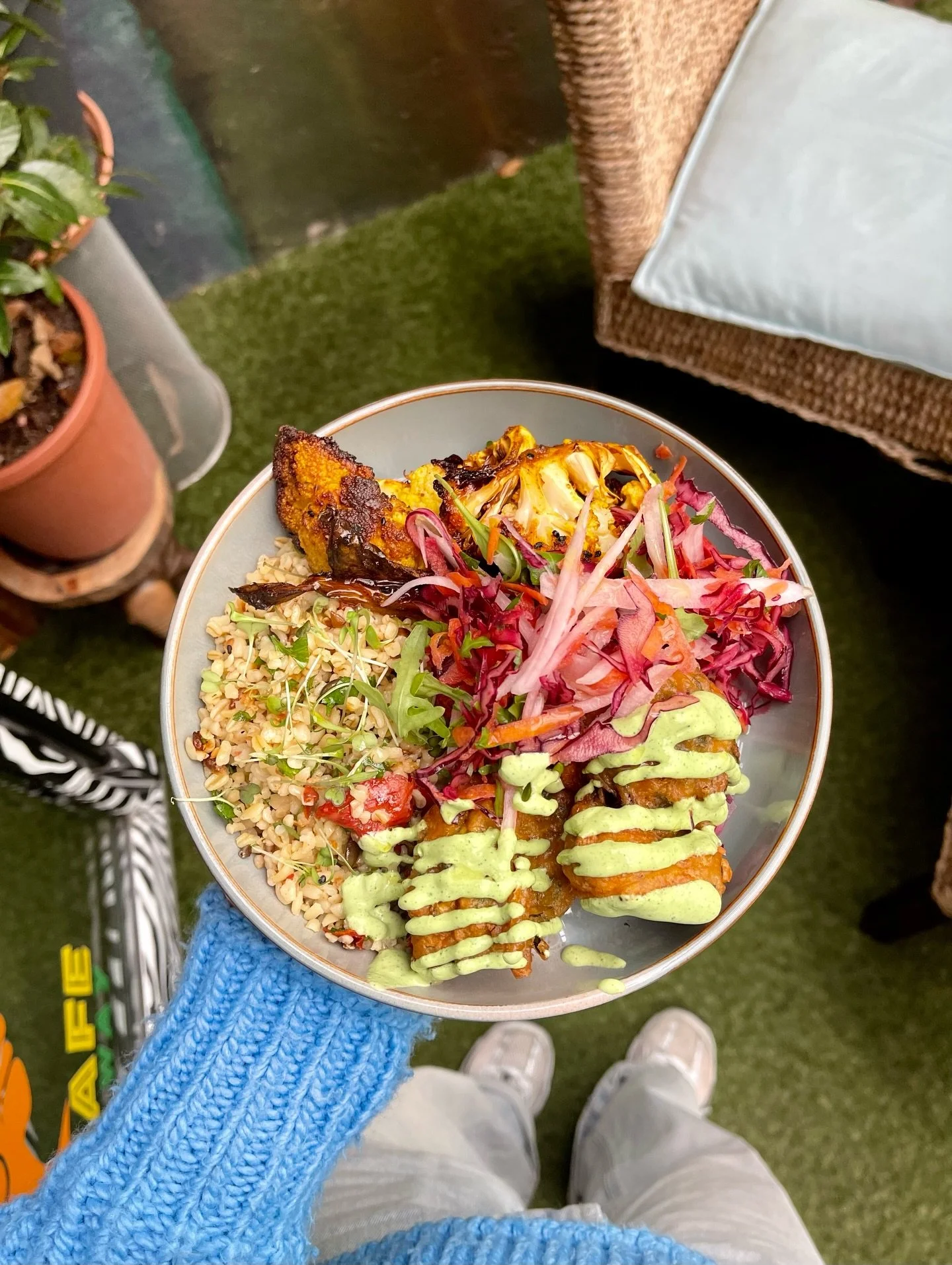 Veggie bowl 🌱💚

Courgette fritters, roast cauliflower, bulgar salad, mint yogurt &amp; daikon slaw