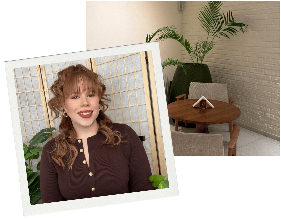 Felishatee Rodriguez in her cozy therapy office with plants in the background.
