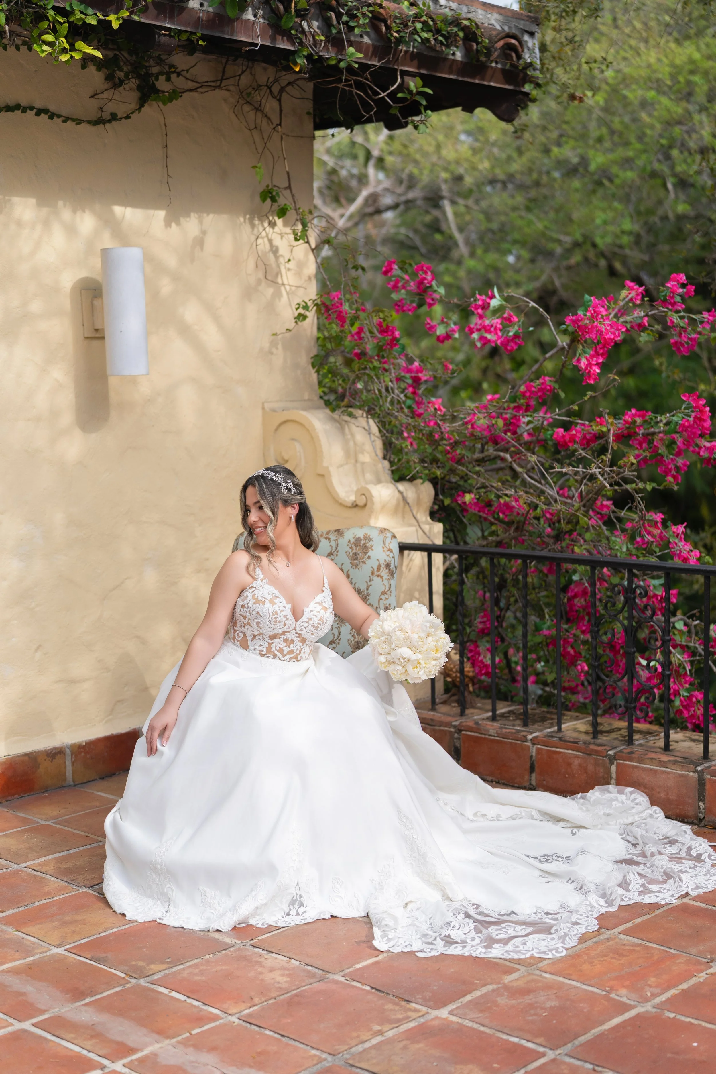 Elegant bride in a luxury wedding gown posing outdoors; fine art photography by Star Visual Art, Miami.