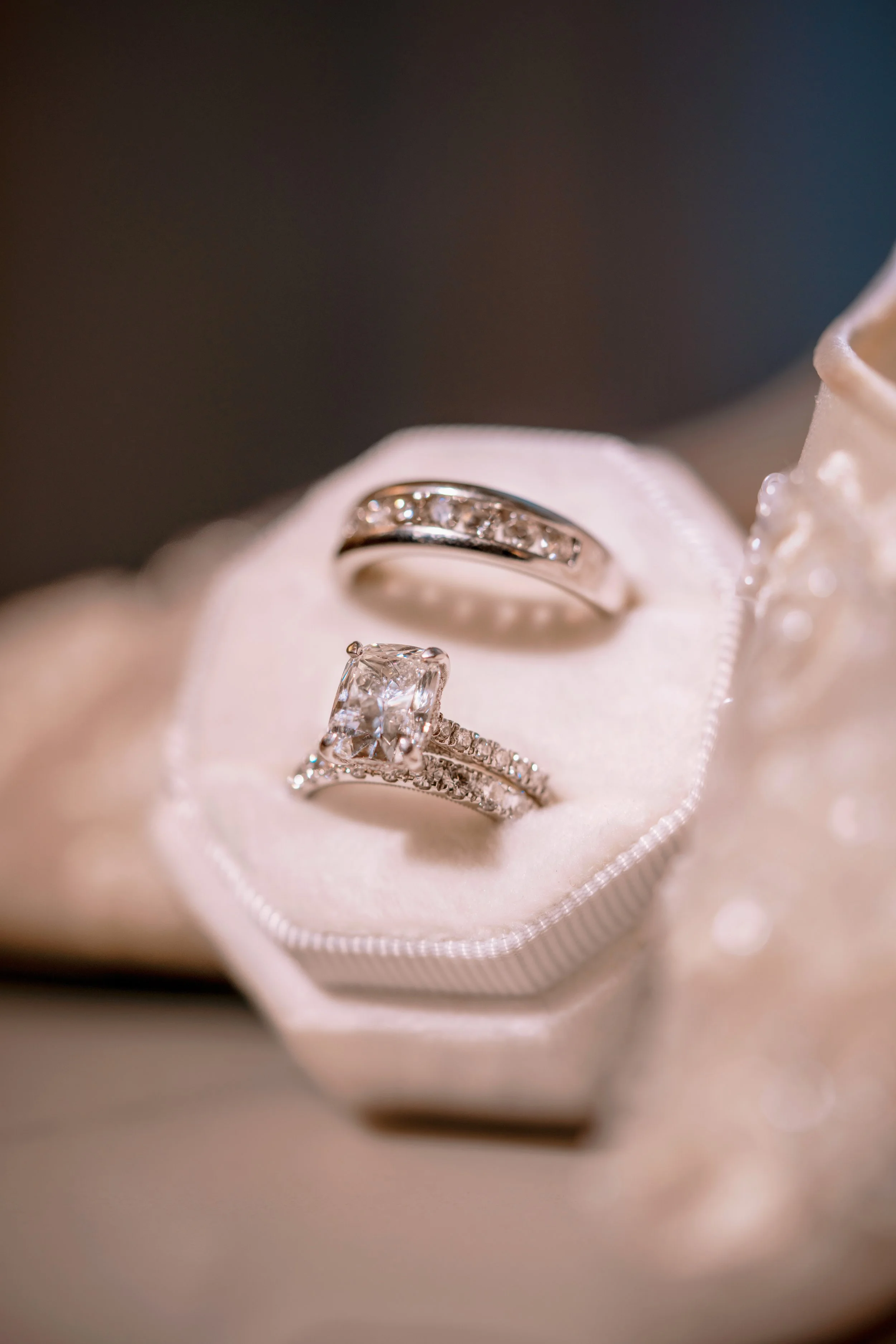 Luxury diamond wedding rings and bands at HILTON TAMPA DOWNTOWN; fine art wedding photography by Star Visual Art, Tampa.