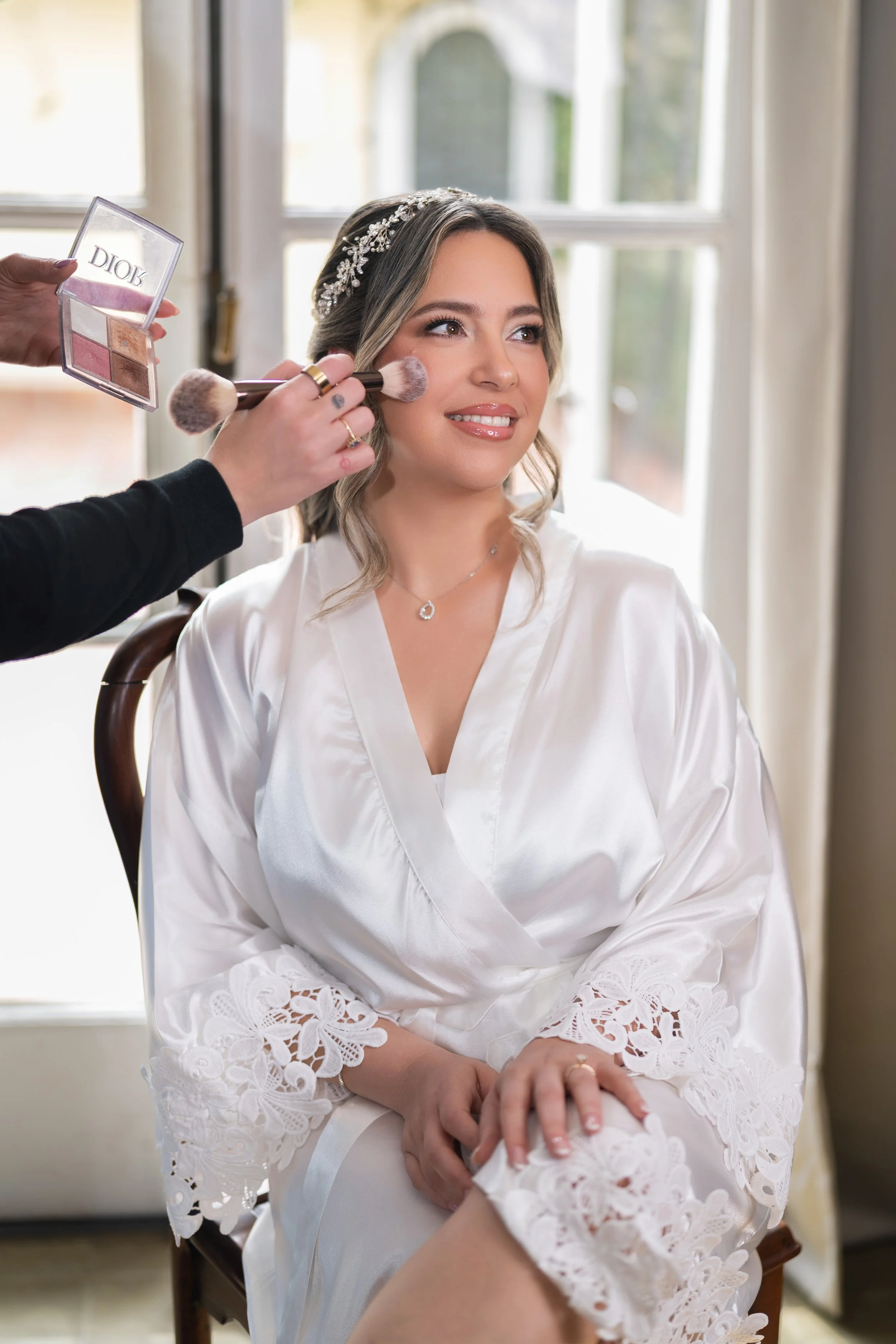 Close-up of elegant bride during makeup application; fine art wedding photography by Star Visual Art, Miami.