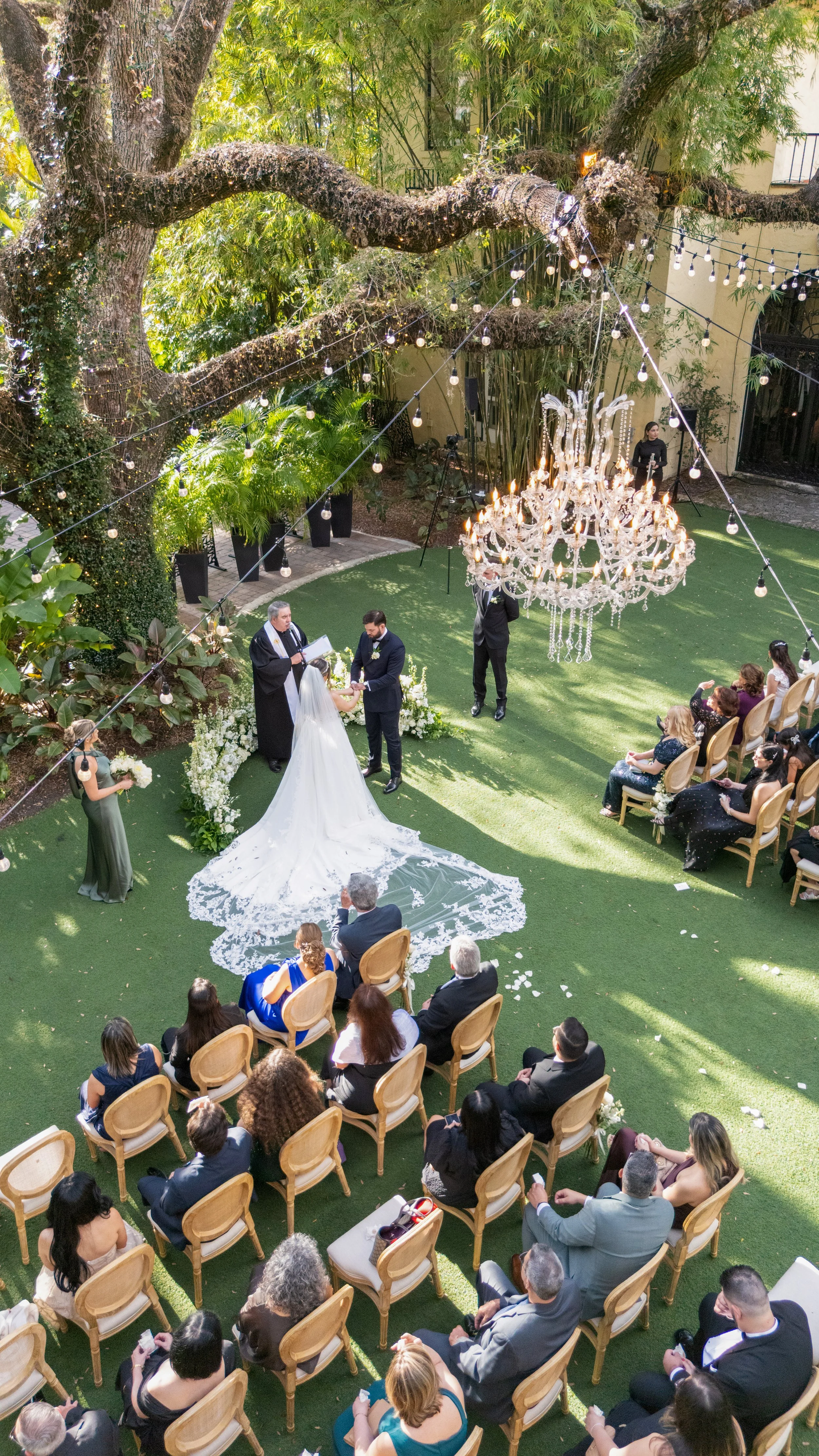High-angle view of a luxury outdoor wedding ceremony at Villa Woodbine; professional event photography by Star Visual Art, Miami.
