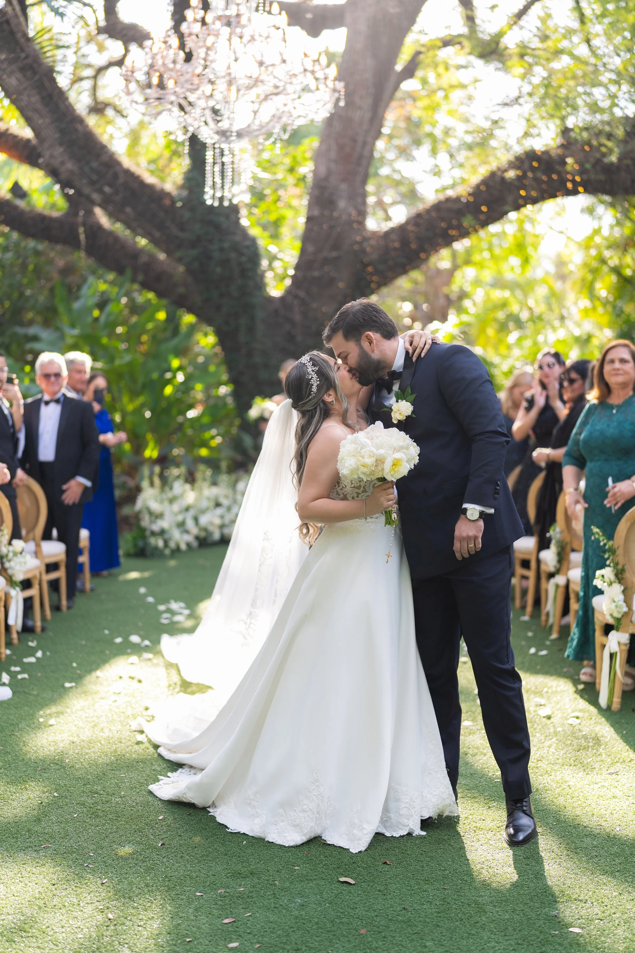 Romantic wedding kiss at Villa Woodbine gardens; fine art wedding photography by Star Visual Art, Miami.
