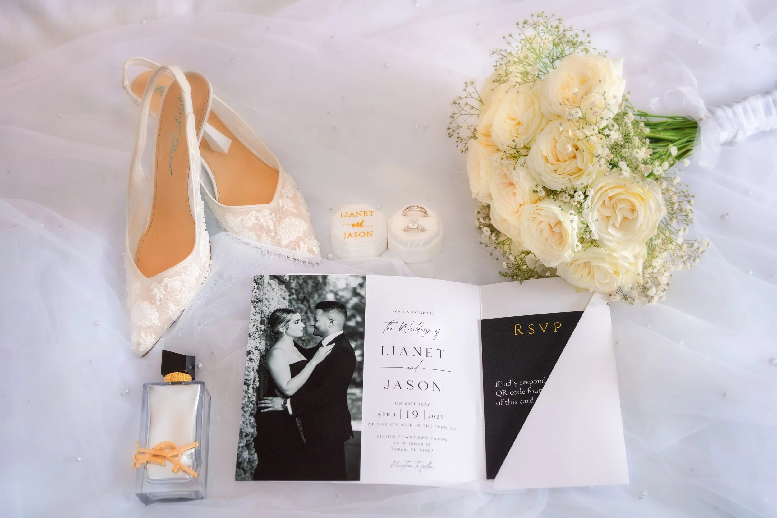 Elegant wedding day details and stationery at Hilton Tampa Downtown; fine art wedding photography by Star Visual Art, Tampa.
