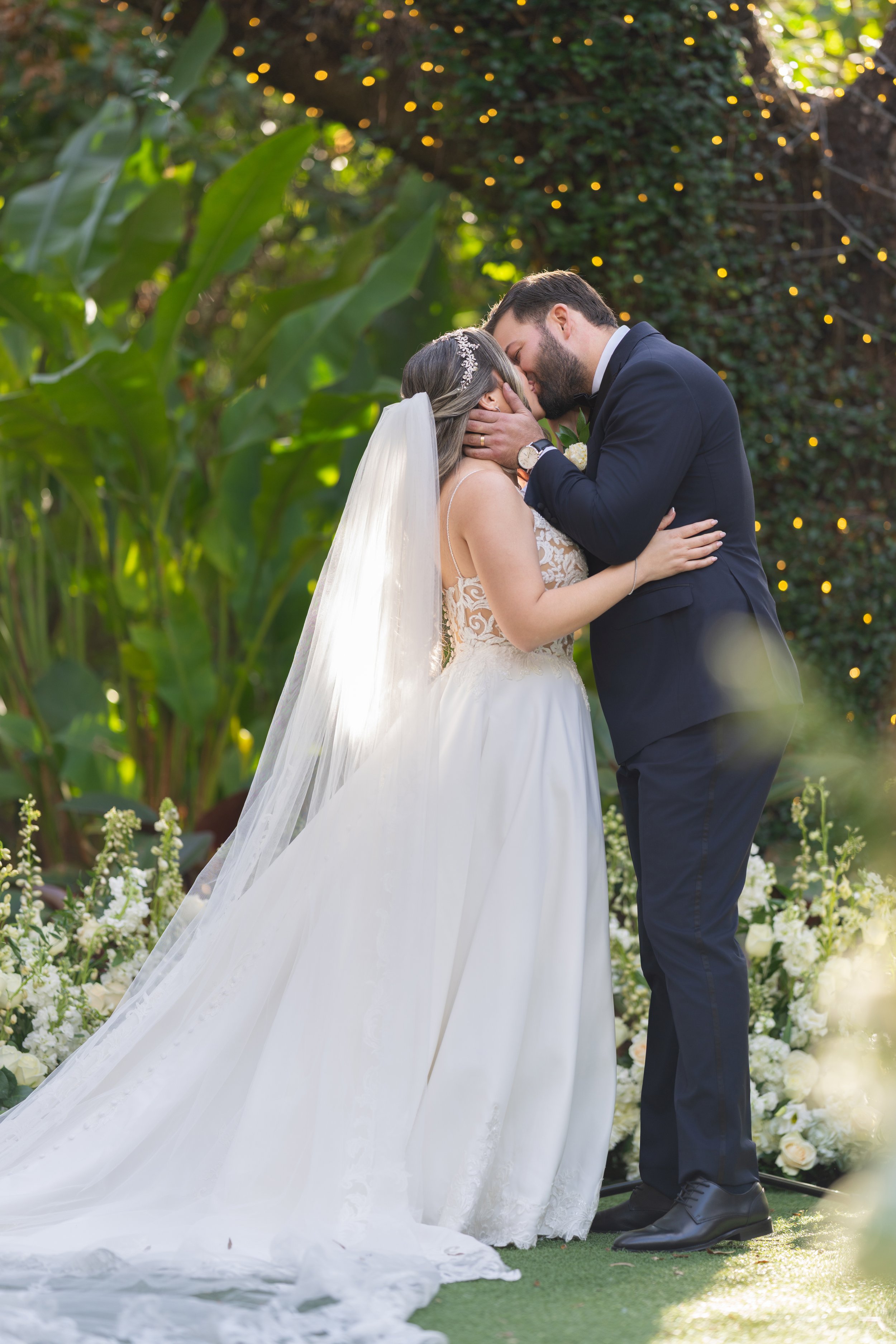 Romantic wedding kiss at Villa Woodbine gardens; fine art wedding photography by Star Visual Art, Miami.