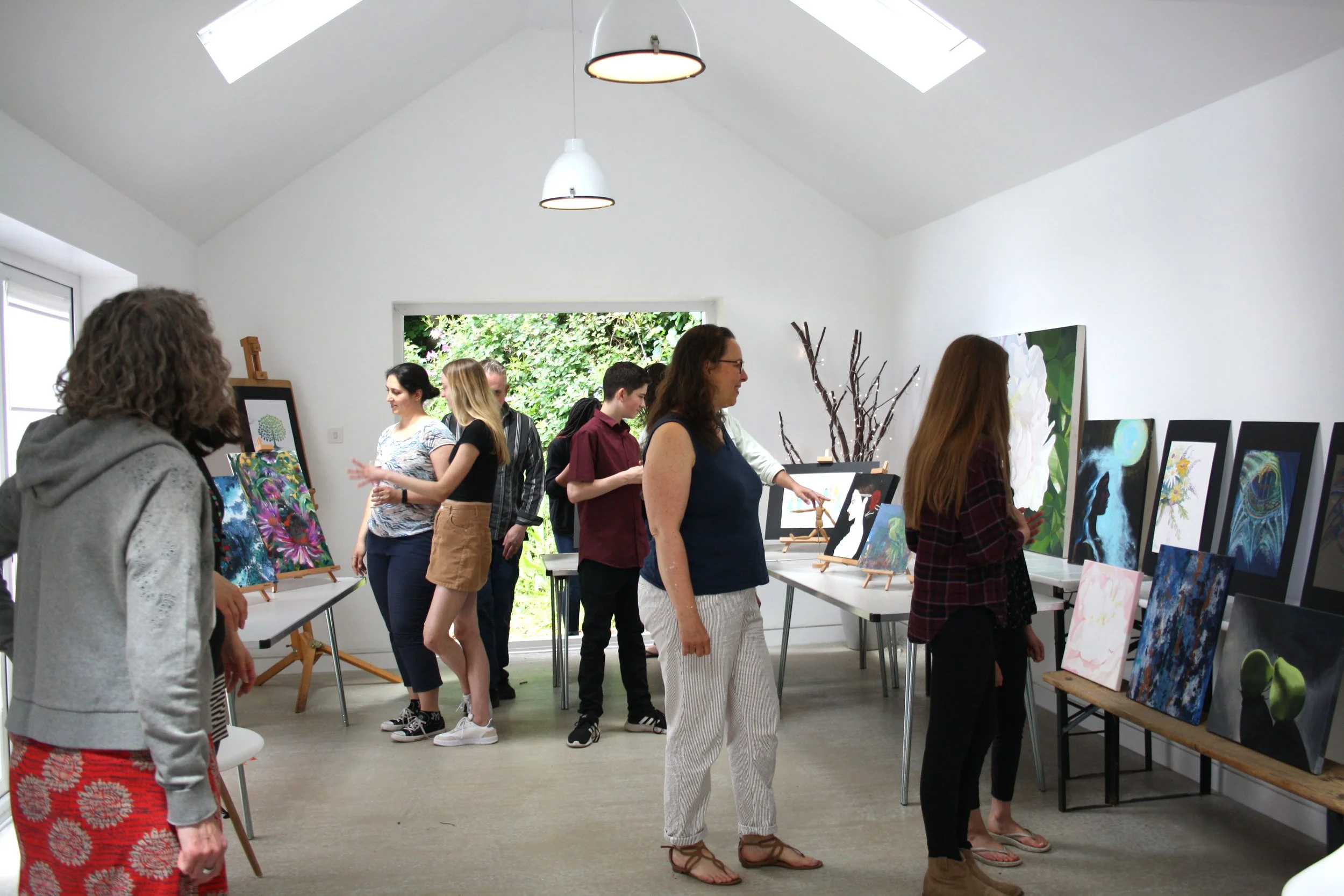 A photo of visitors to an art exhibition