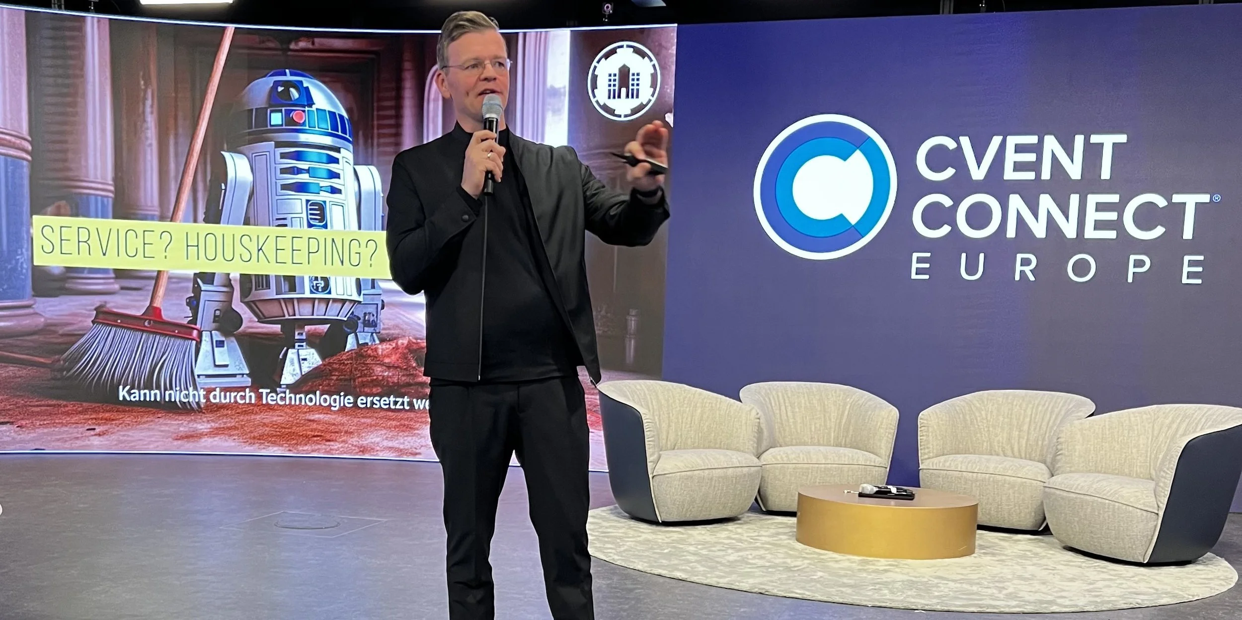 Bernd Fritzges speaking on a conference stage