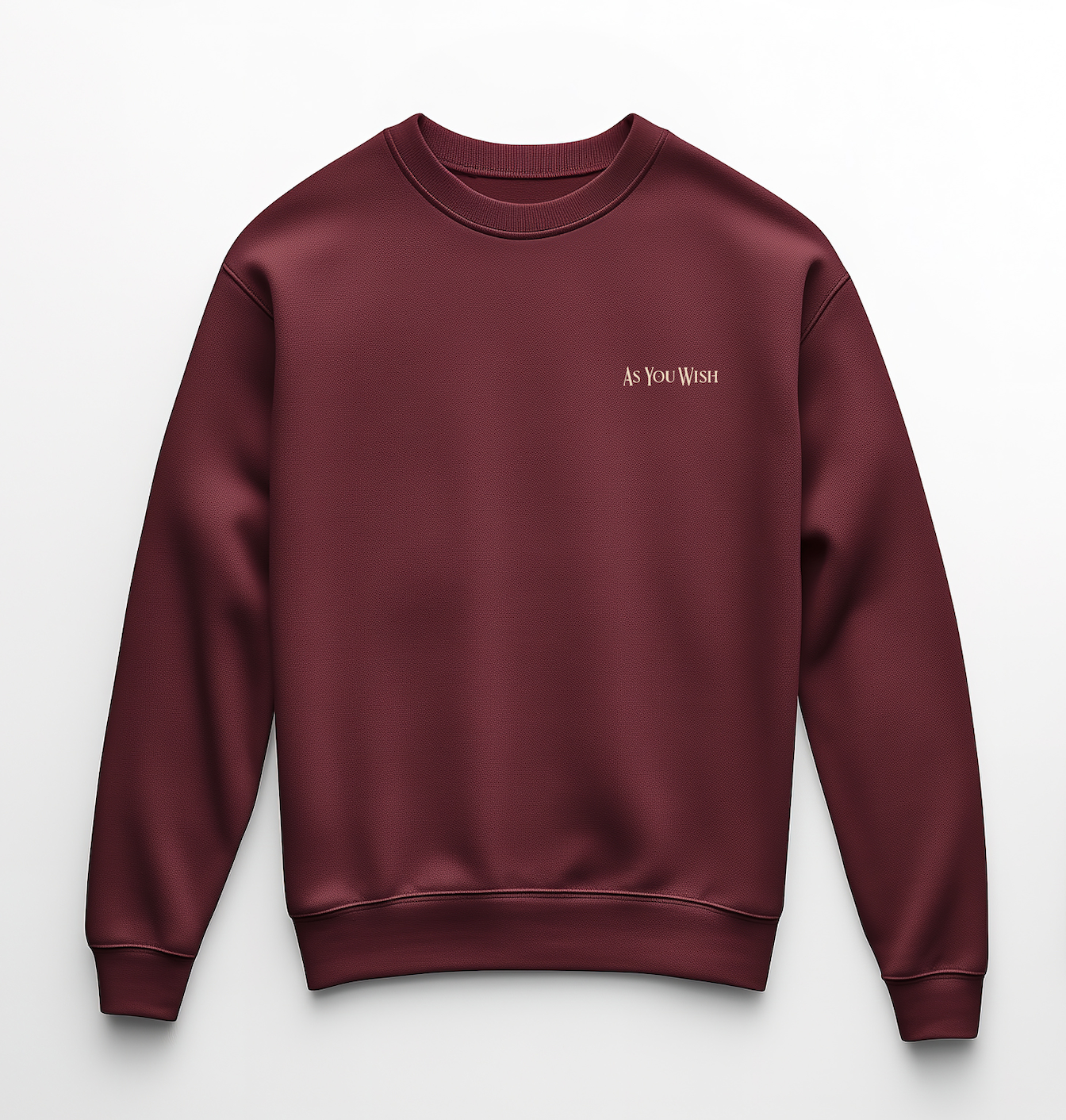 Maroon sweatshirt with small beige text saying 'As You Wish' on the left chest. Princess Bride sweatshirt created by graphic design student Kenzie Coates