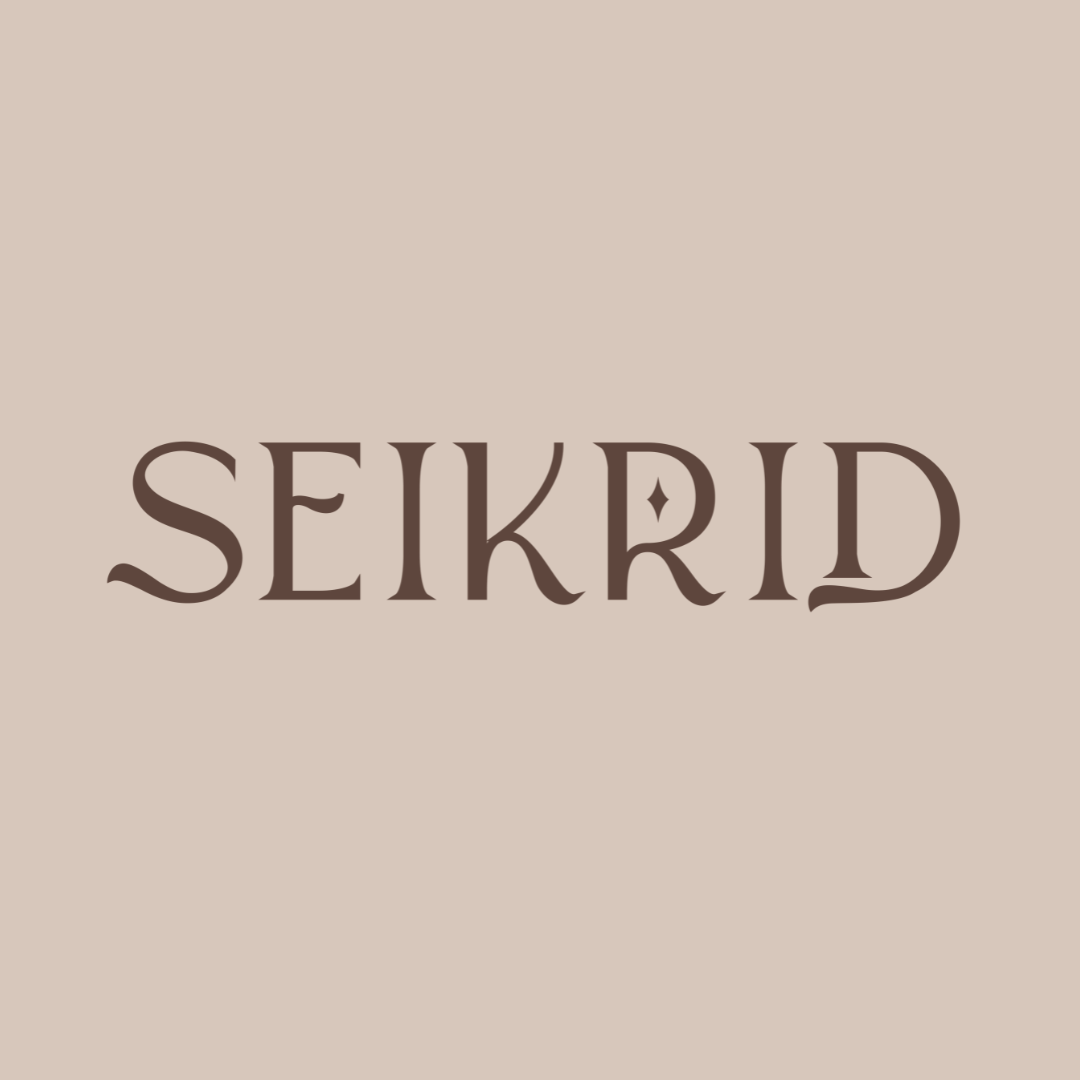 The word 'SEKRID' in stylized brown font on a beige background.