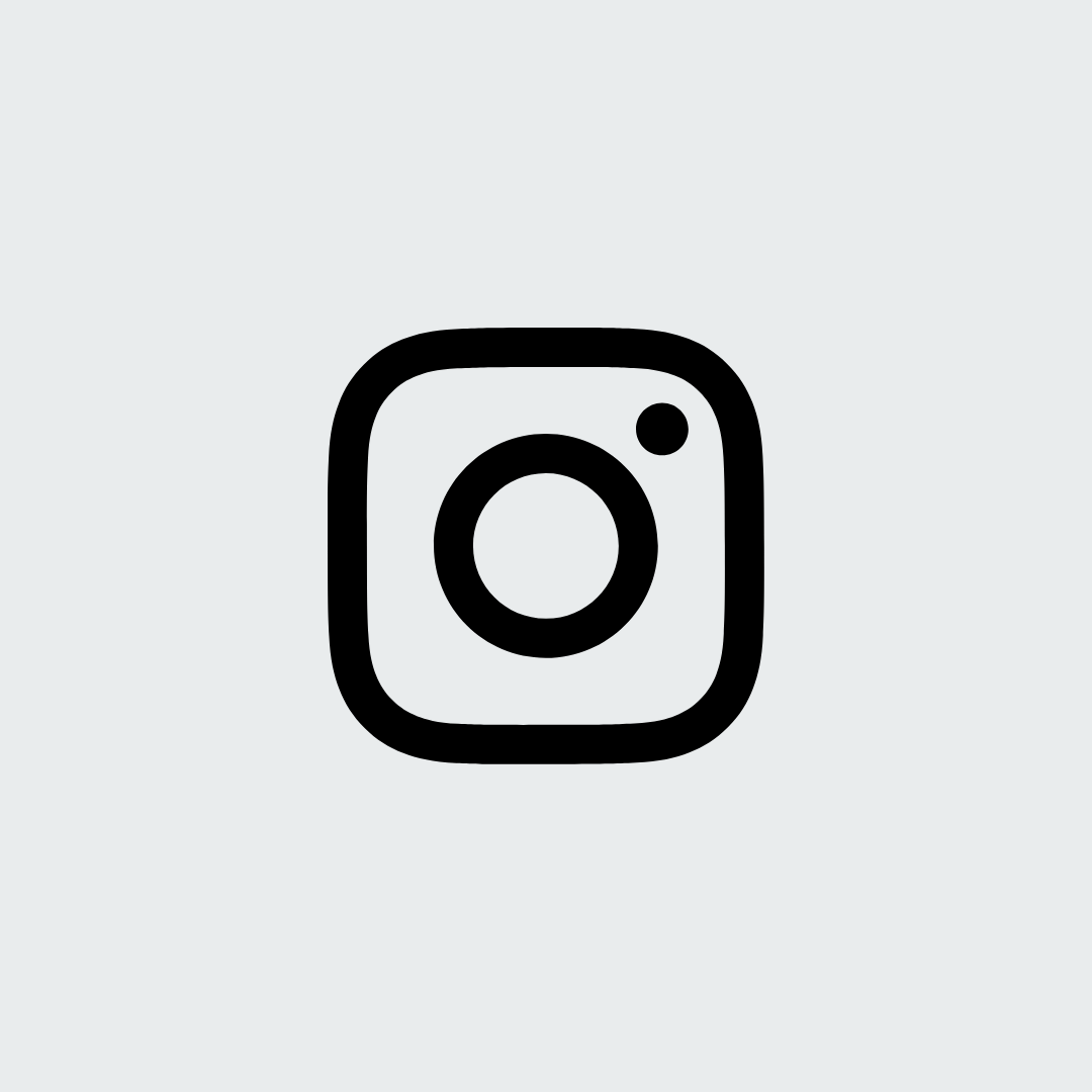Instagram logo in black on a light gray background.