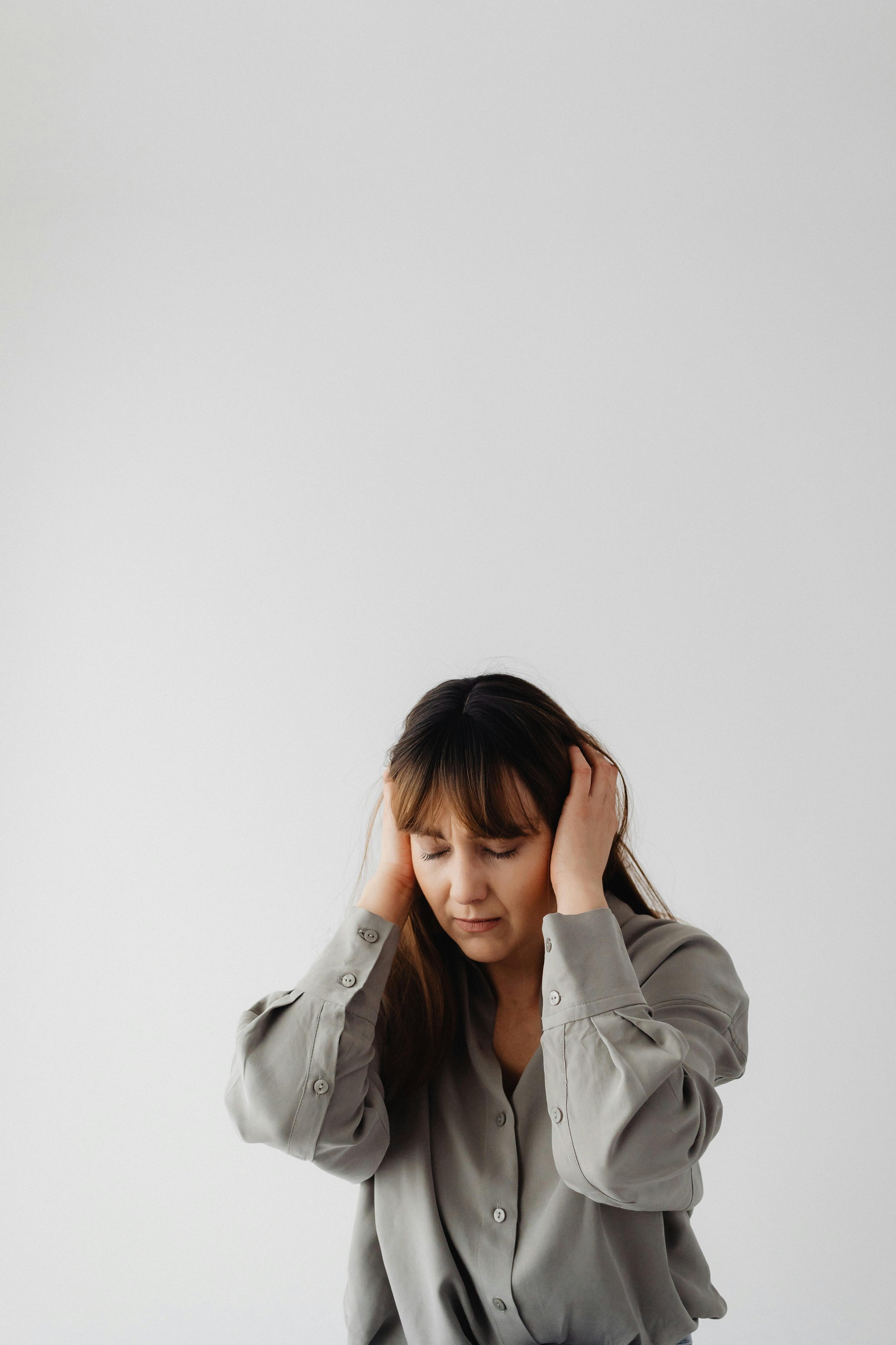 A young lady going through a panic moment.