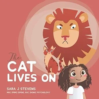 Cover of a book titled "The Cat Lives On" showing a cartoon lion with a serious expression and a small girl with curly hair looking up, with a small cat sitting beside her.