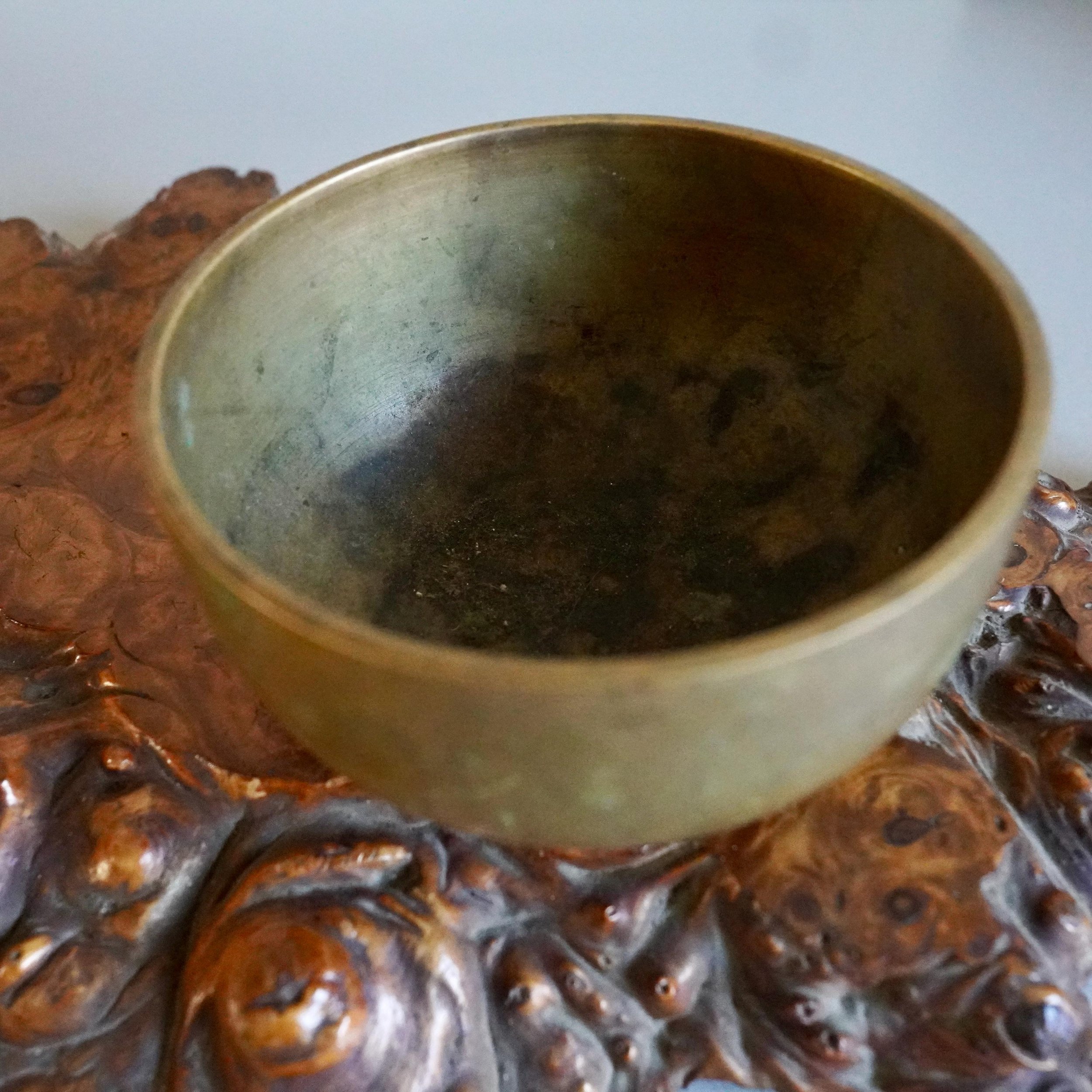 Bronze orin bowl interior, aged bronze tone