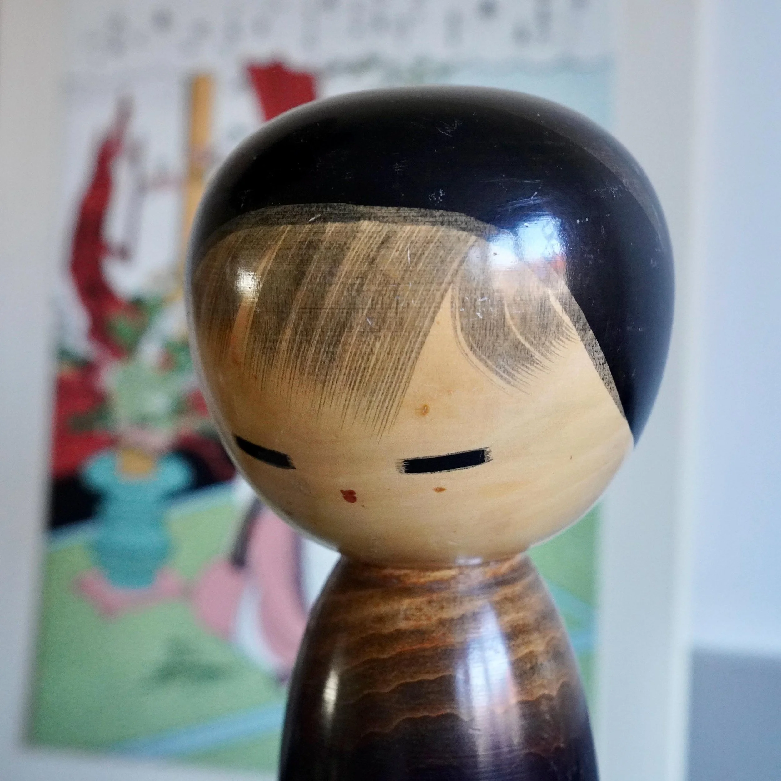 Watanabe Masao sosaku kokeshi face detail, closed eyes and pale wood head